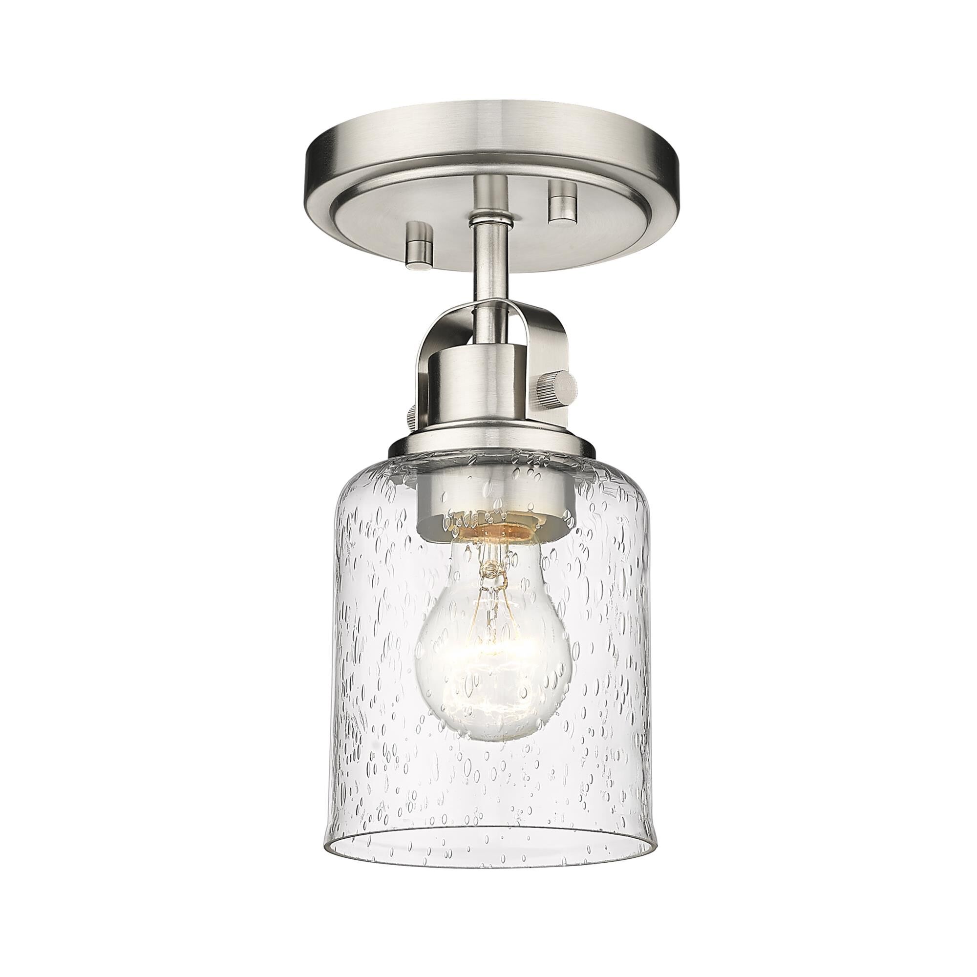 Shown in Brushed Nickel finish and Glass shade