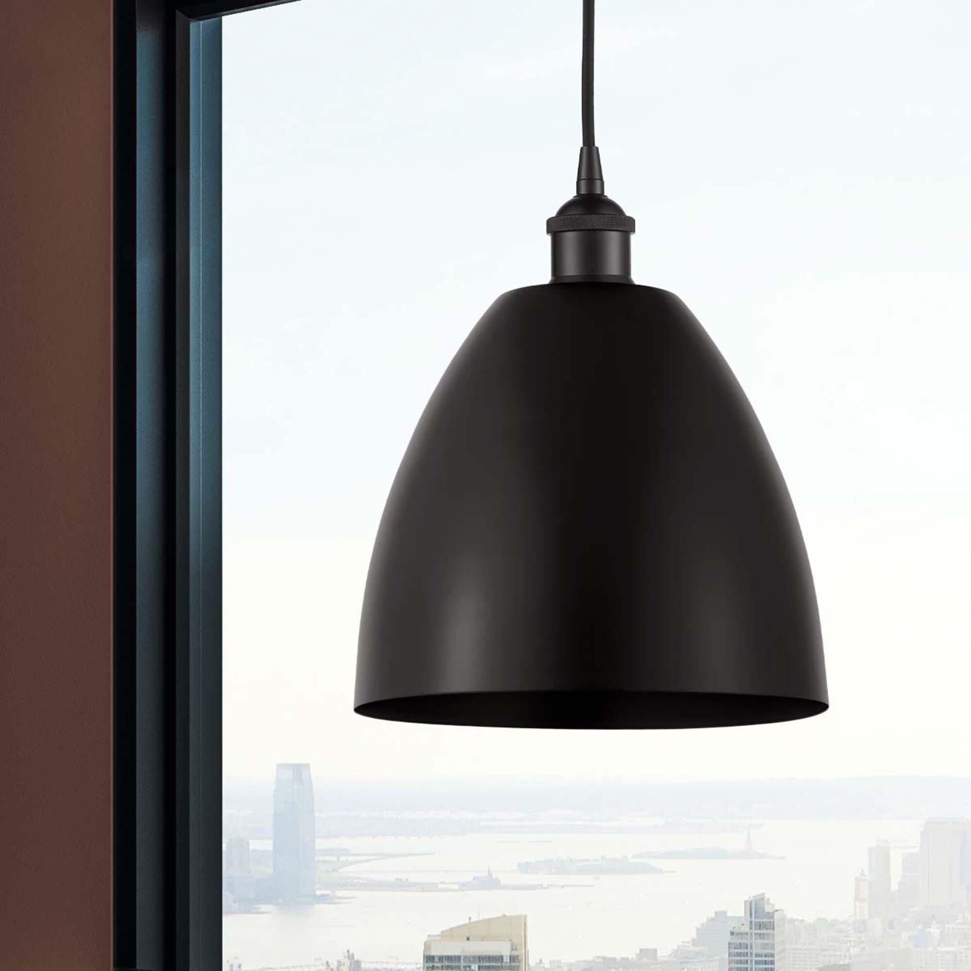 Shown in Matte Black finish and Matte Black Edison Dome shade