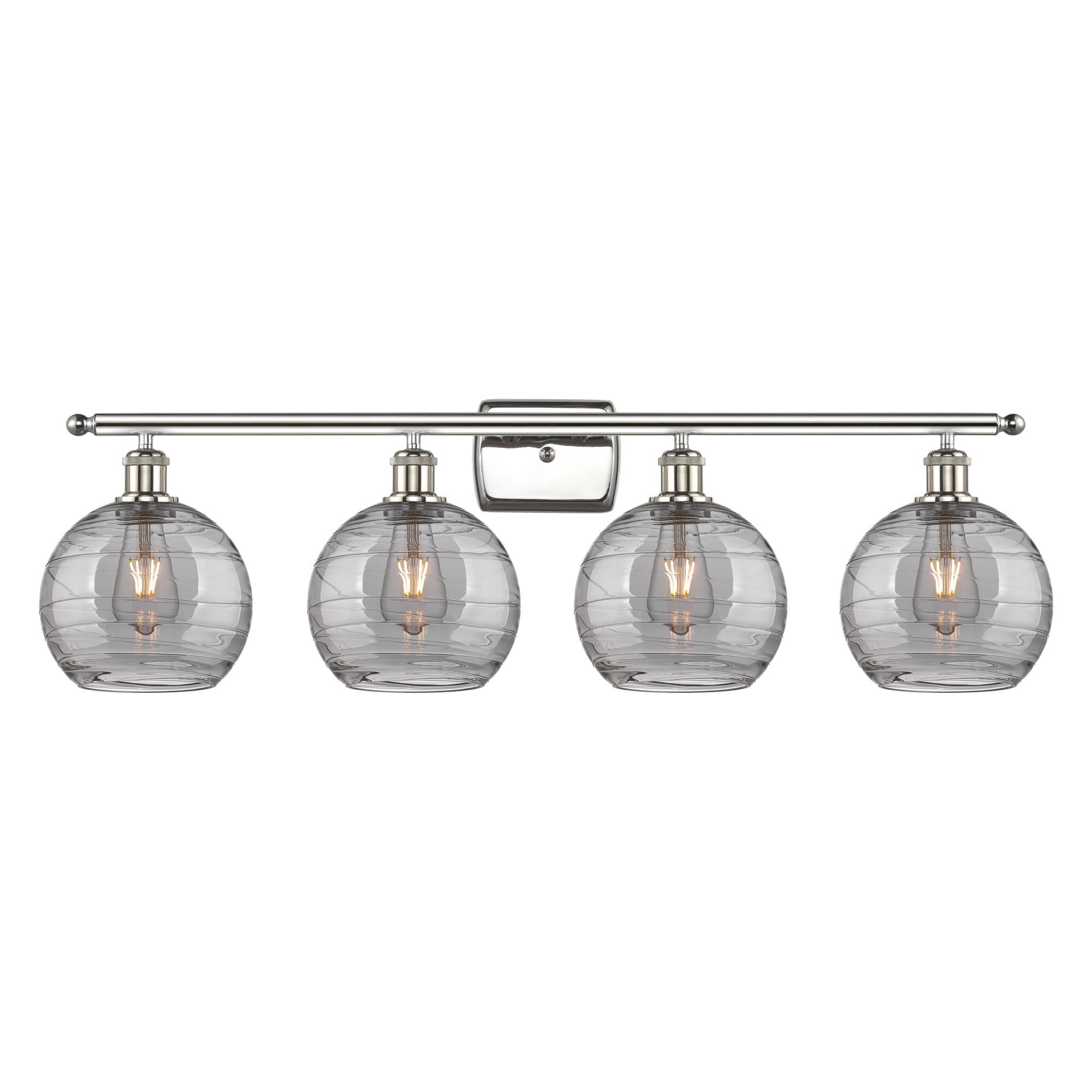 Shown in Polished Nickel finish and Light Smoke Deco Swirl glass