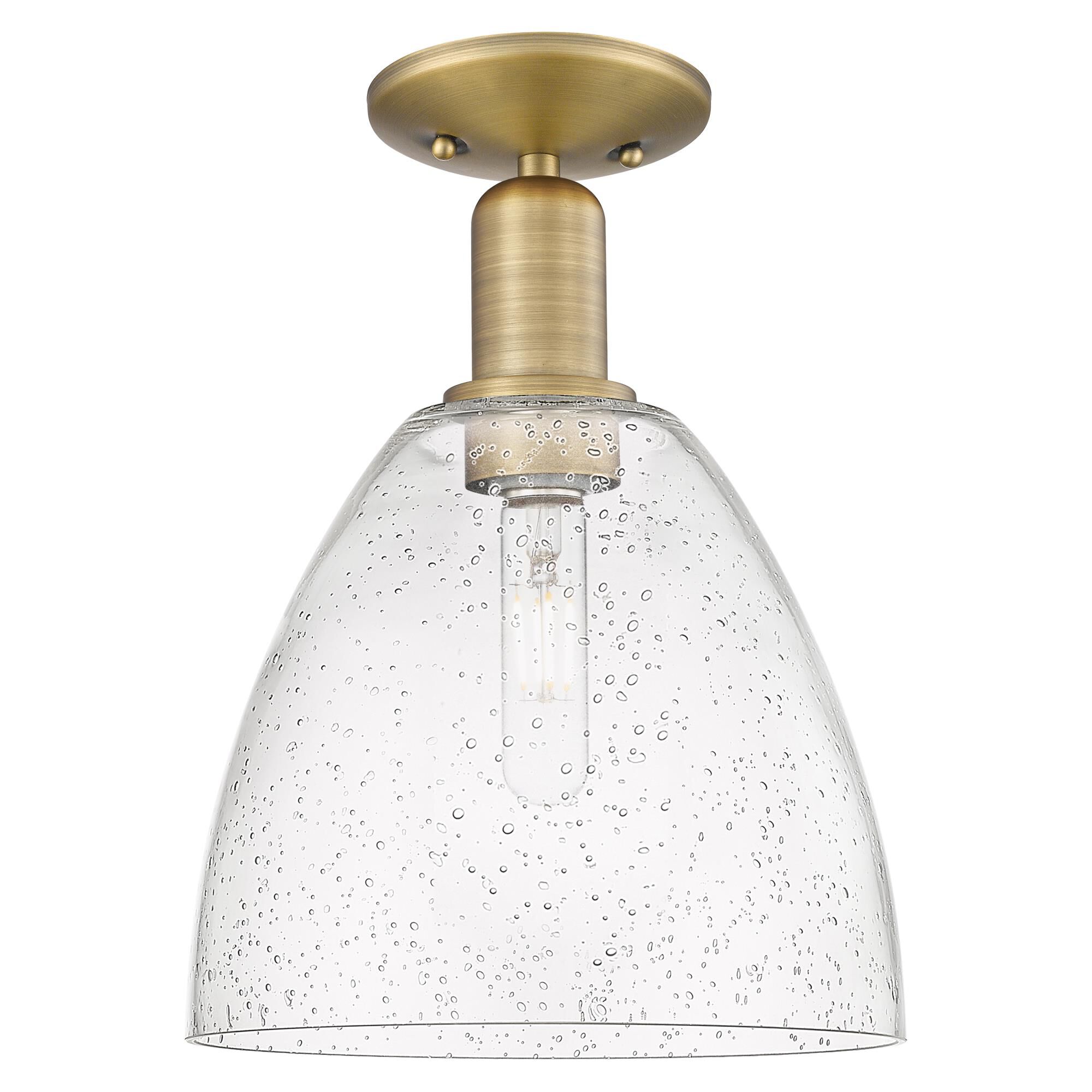 Shown in Brushed Brass finish and Seedy glass