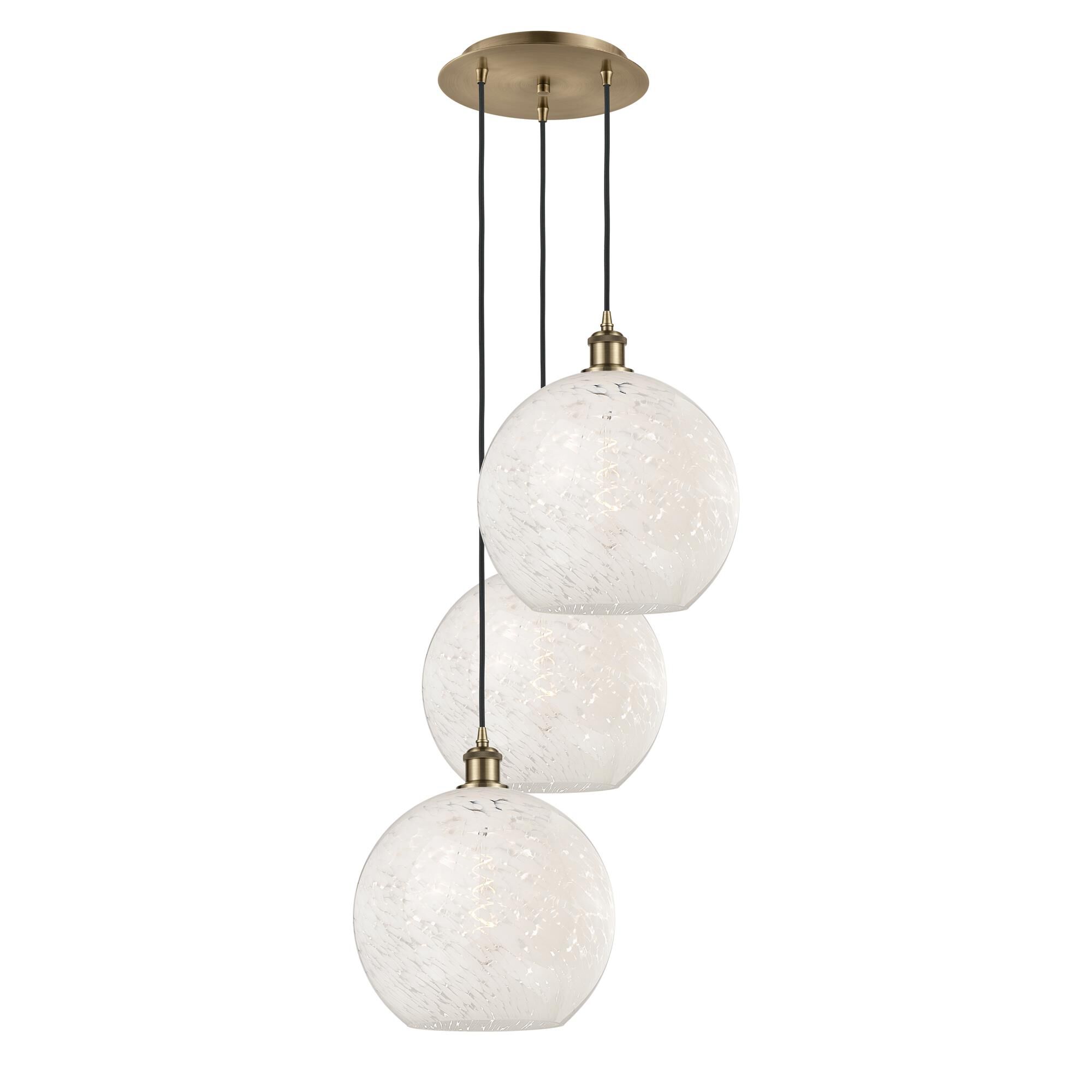 Shown in Antique Brass finish and White Mouchette glass