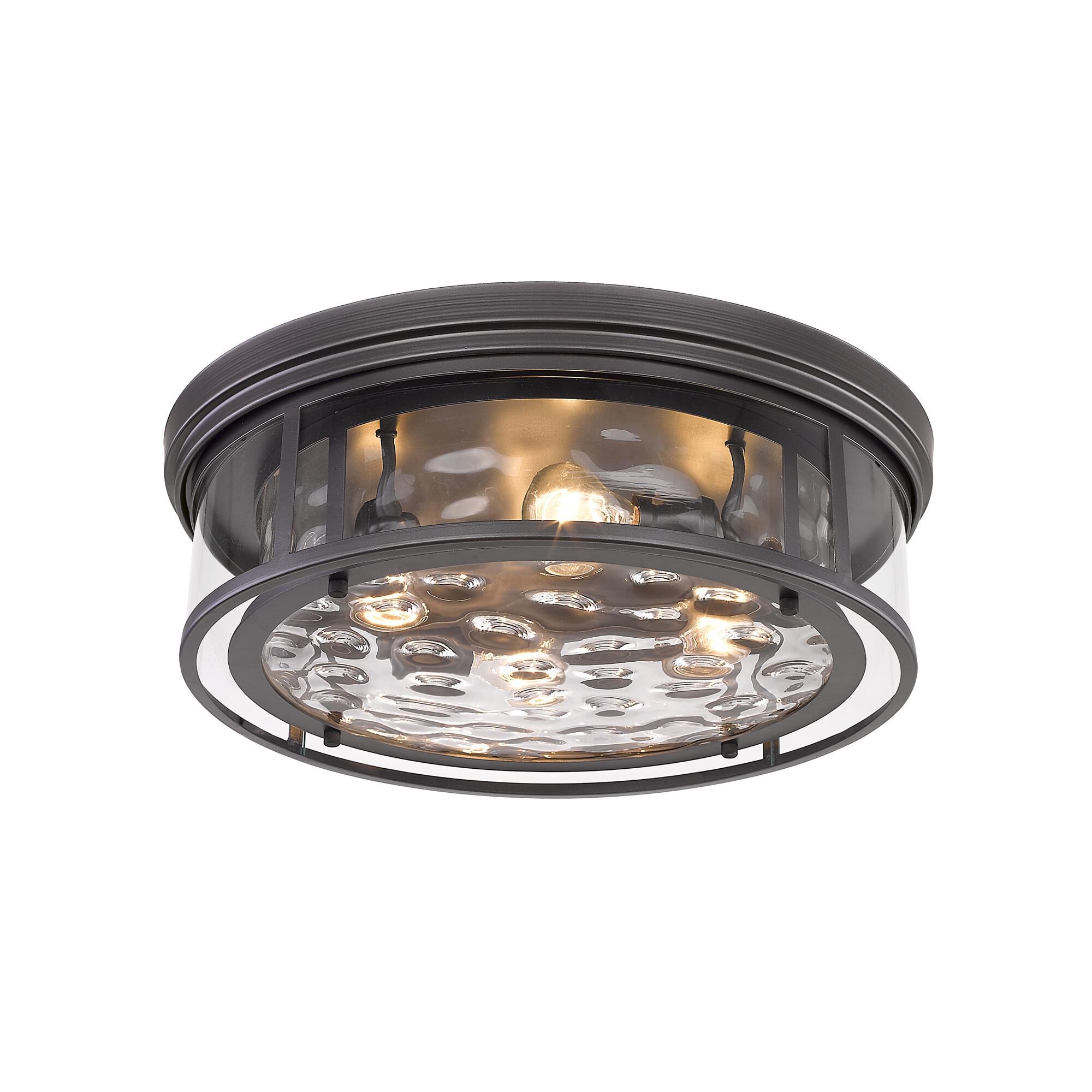 Shown in Bronze finish and Glass shade