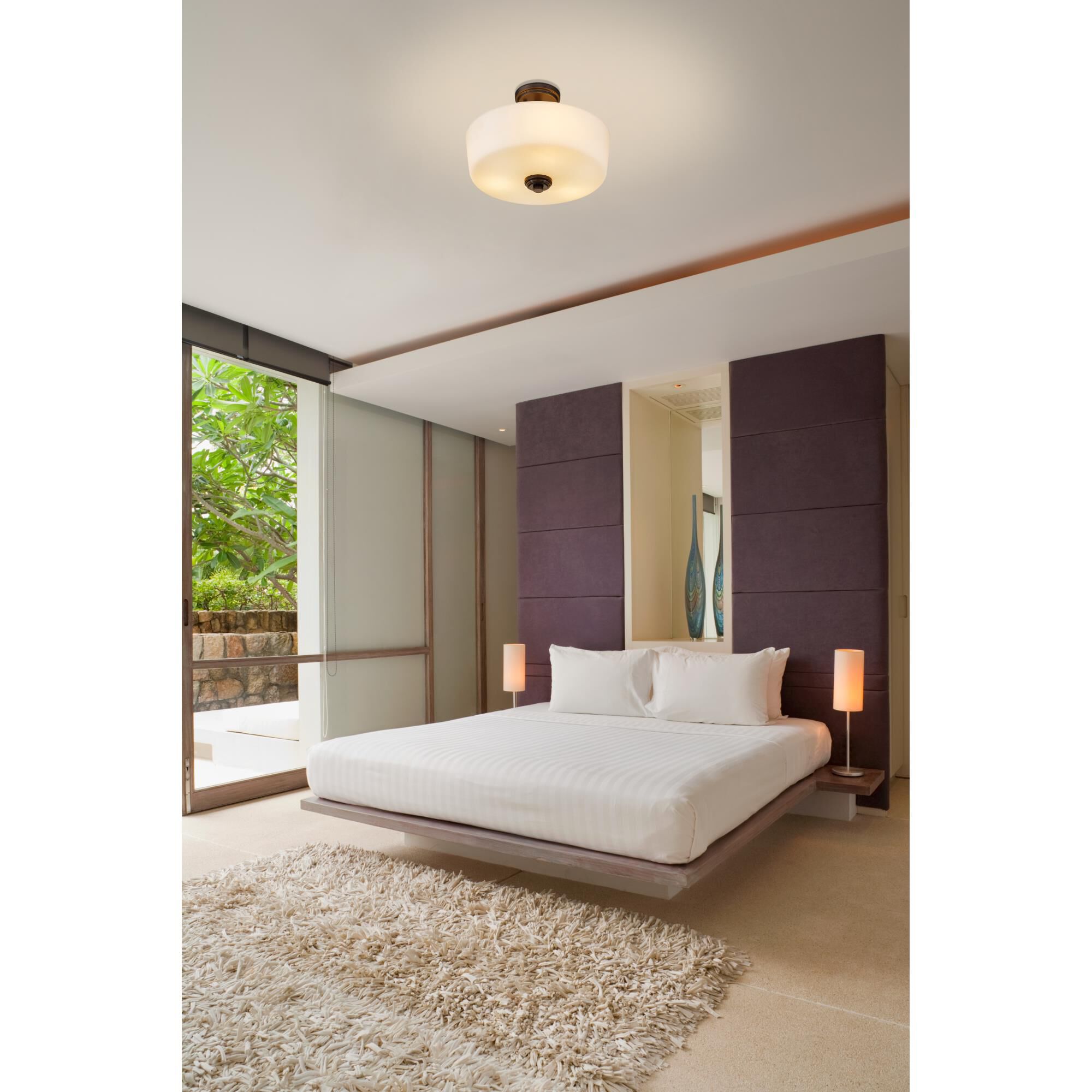 Shown in Bronze finish and Glass shade