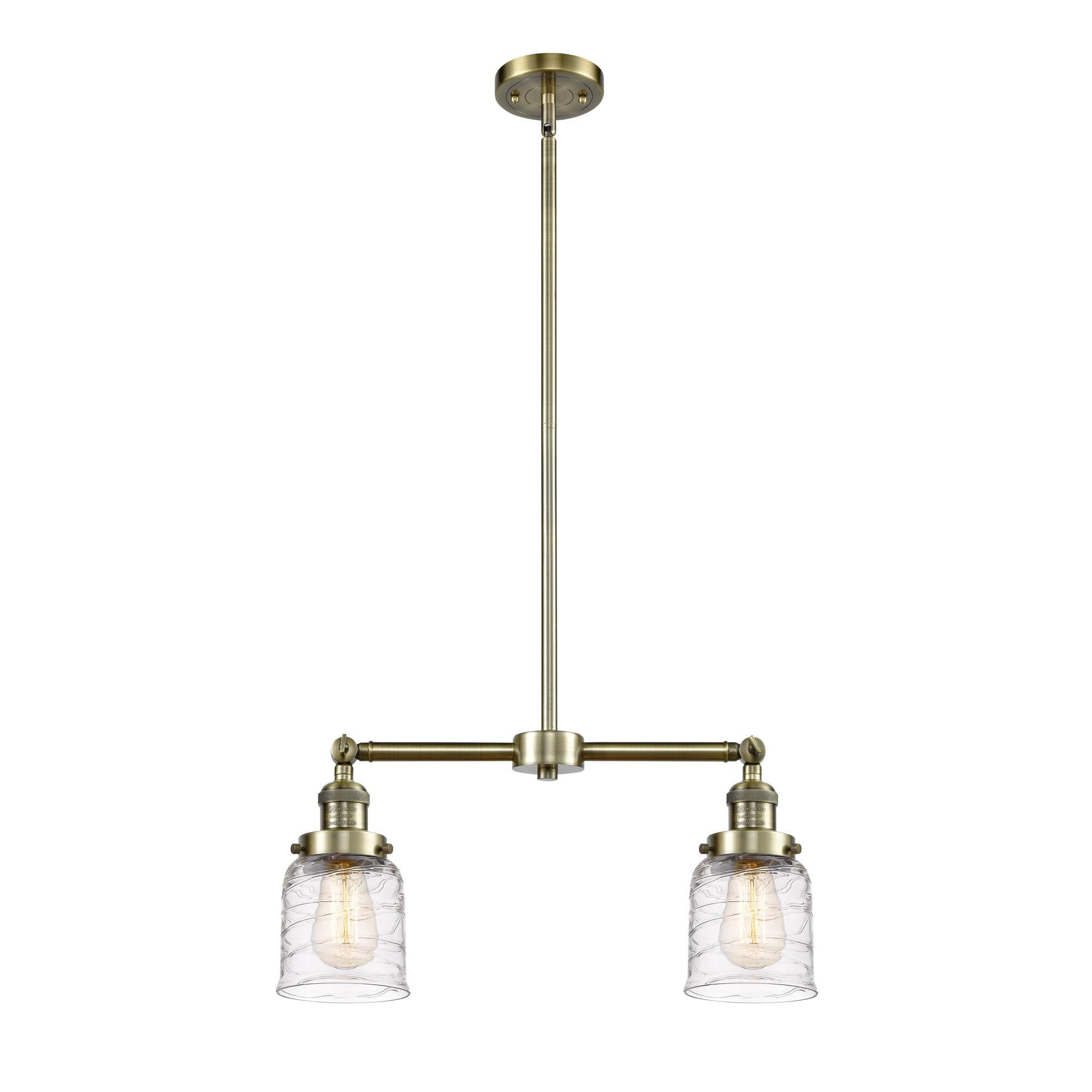 Shown in Antique Brass finish and Clear Deco Swirl Small Bell glass