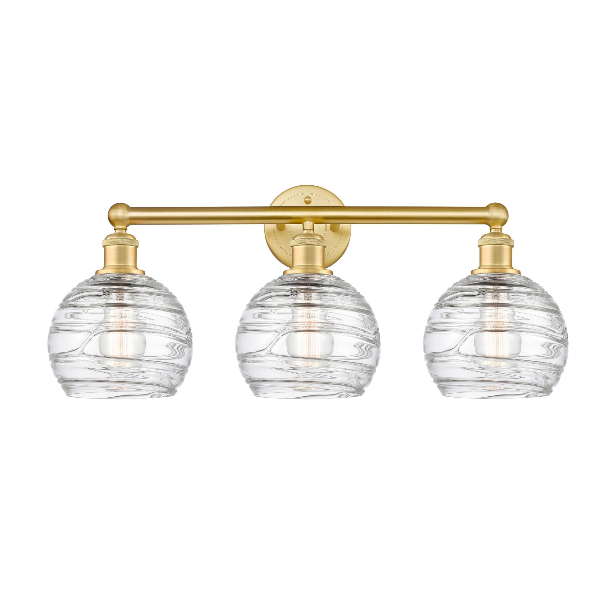 Shown in Satin Gold finish and Clear Deco Swirl glass