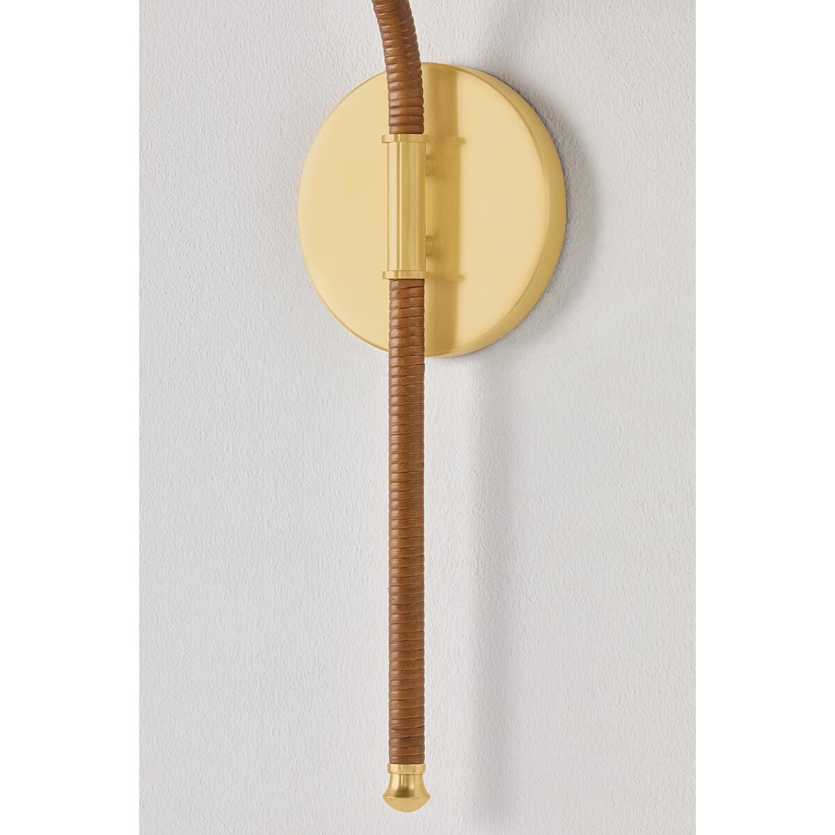 Shown in Aged Brass finish and Natural Woven Rattan shade