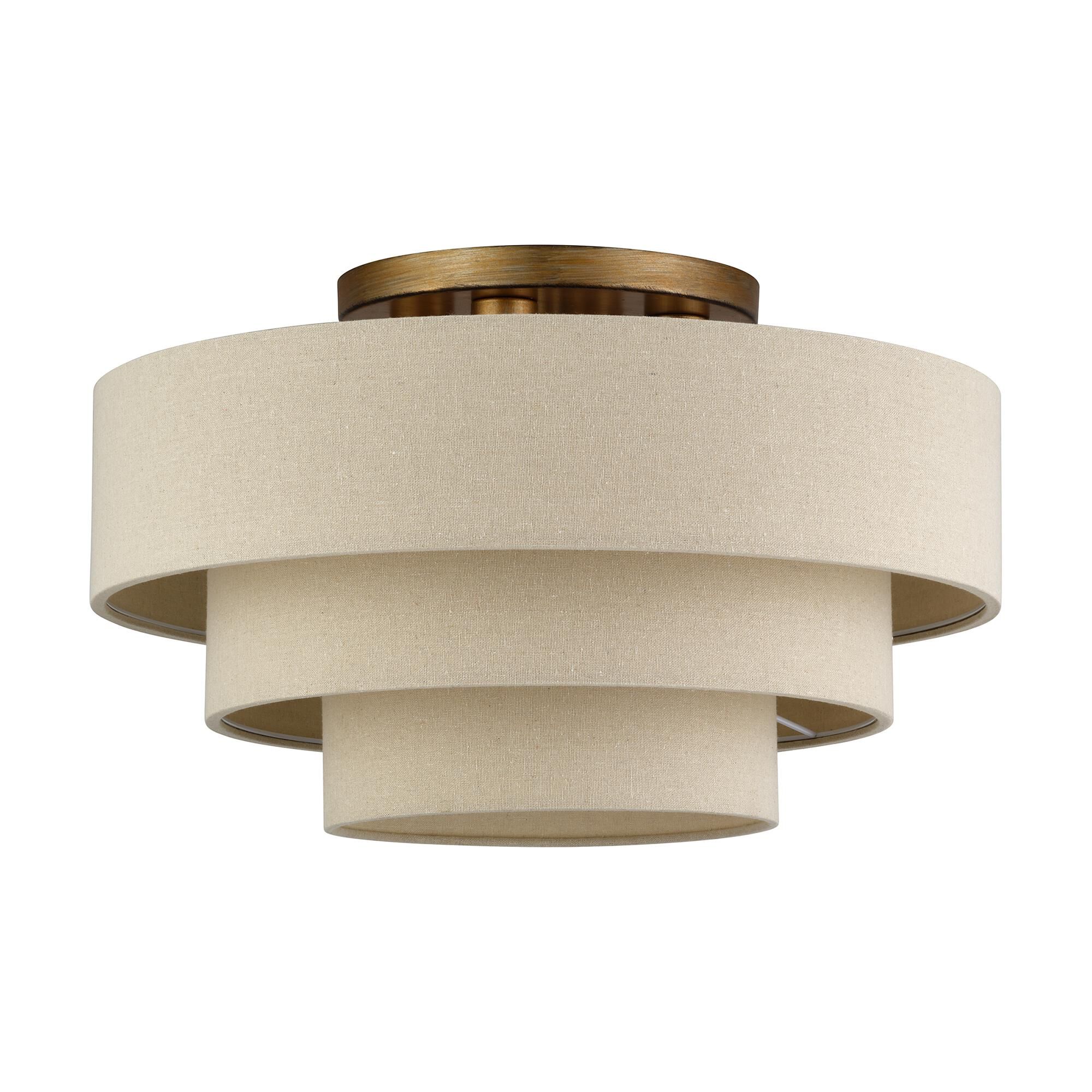 Shown in Antique Gold Leaf finish and Hand Crafted Parchment Color Hardback Fabric shade