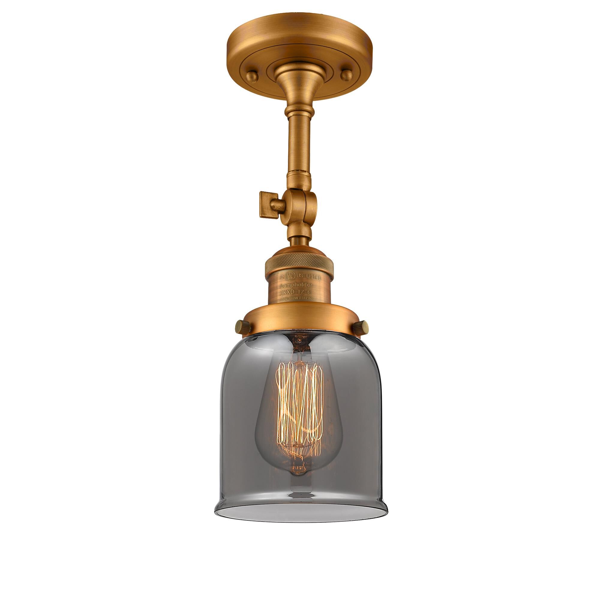 Shown in Brushed Brass finish and Plated Smoked glass and None accent