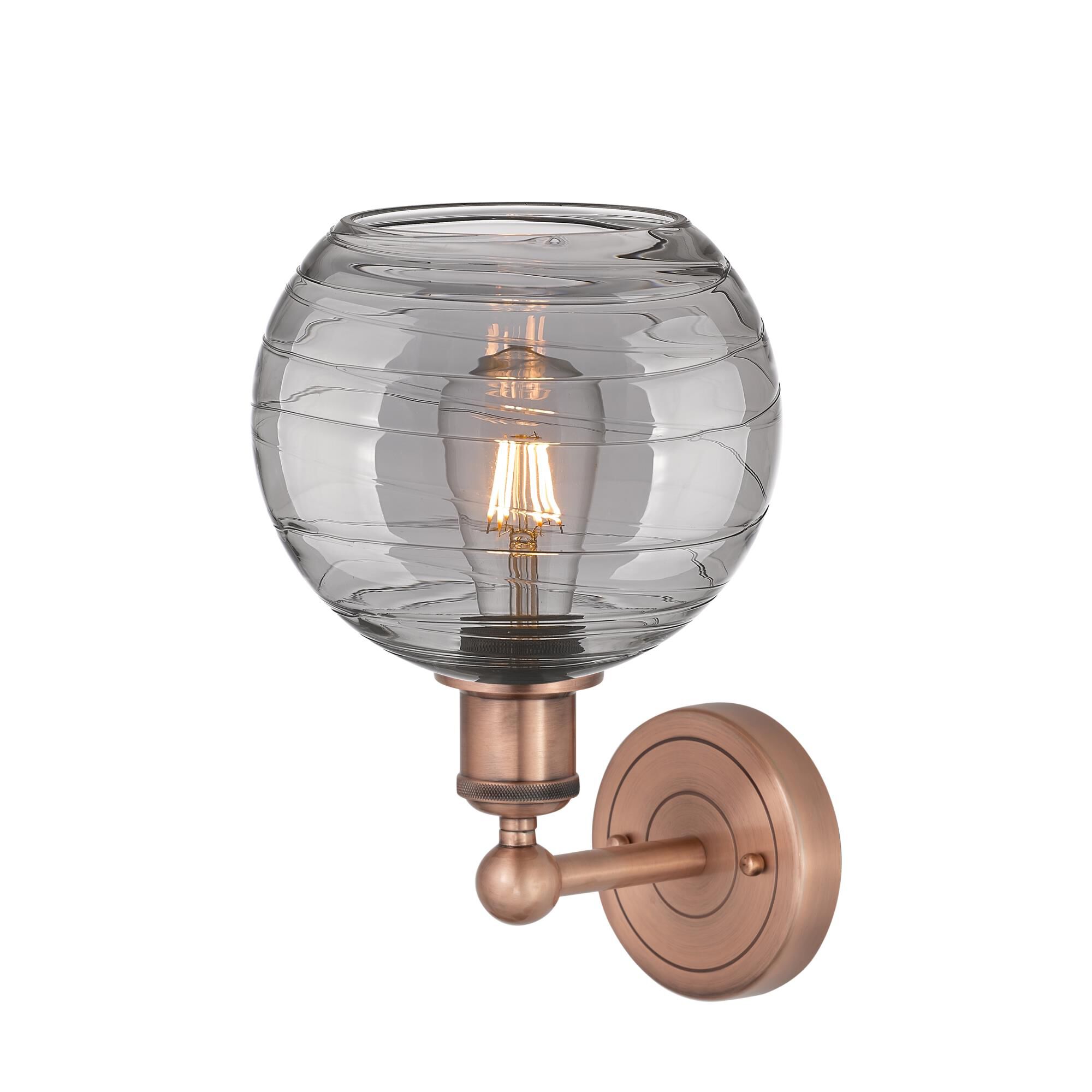Shown in Antique Copper finish and Light Smoke Deco Swirl glass