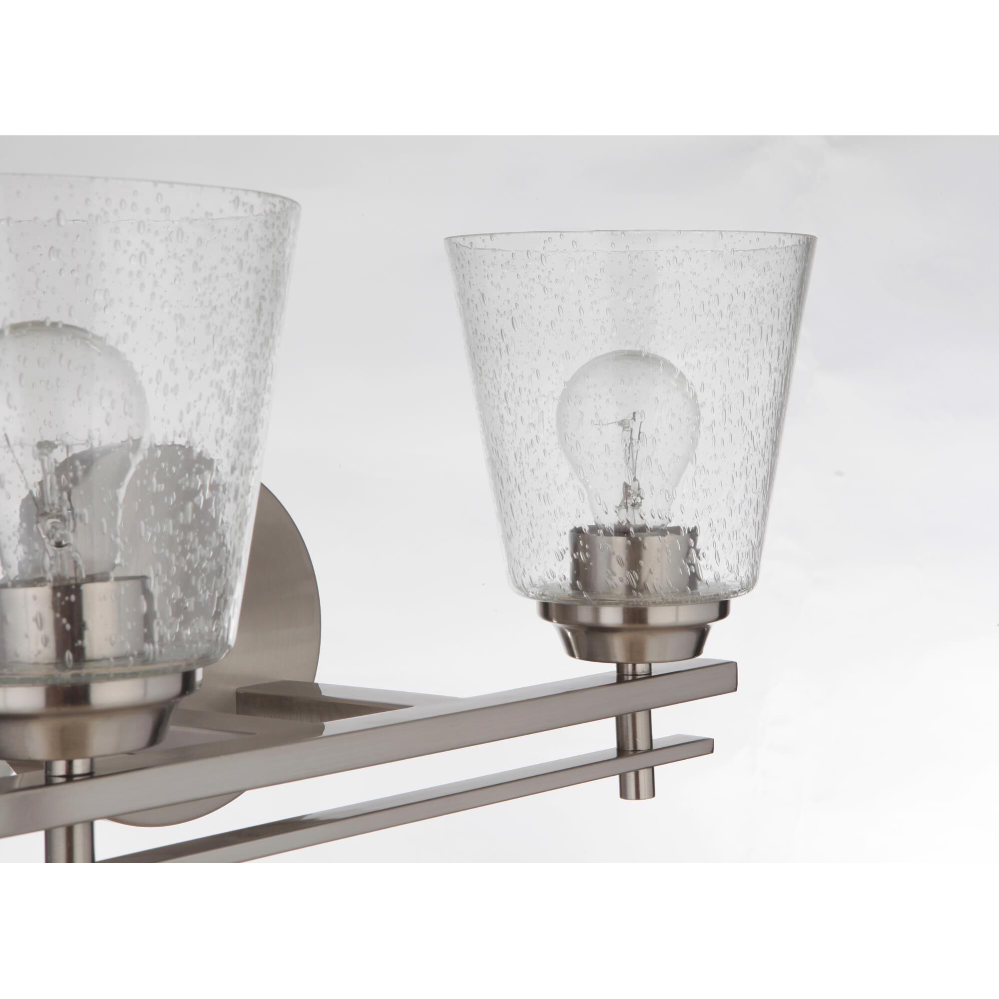Shown in Brushed Polished Nickel finish and Clear Seeded glass and Glass shade