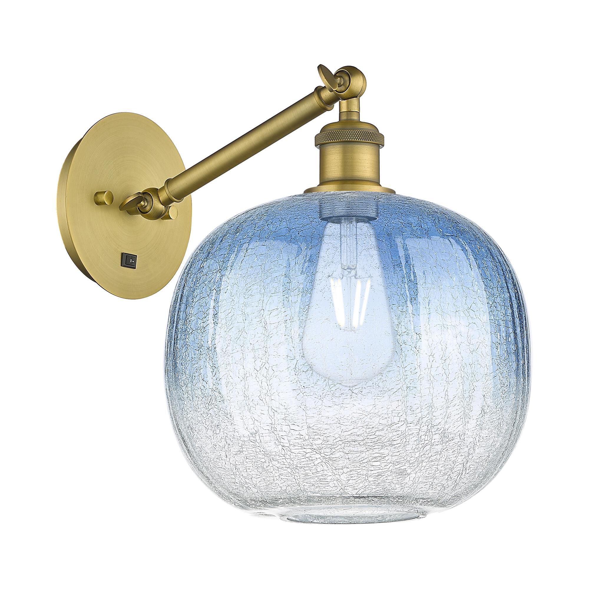 Shown in Brushed Brass finish and Sapphire Blue glass