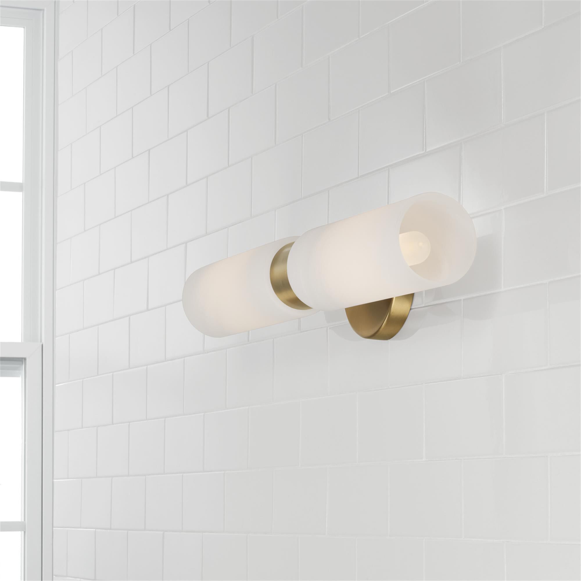 Shown in Aged Brass finish and Faux Alabaster glass