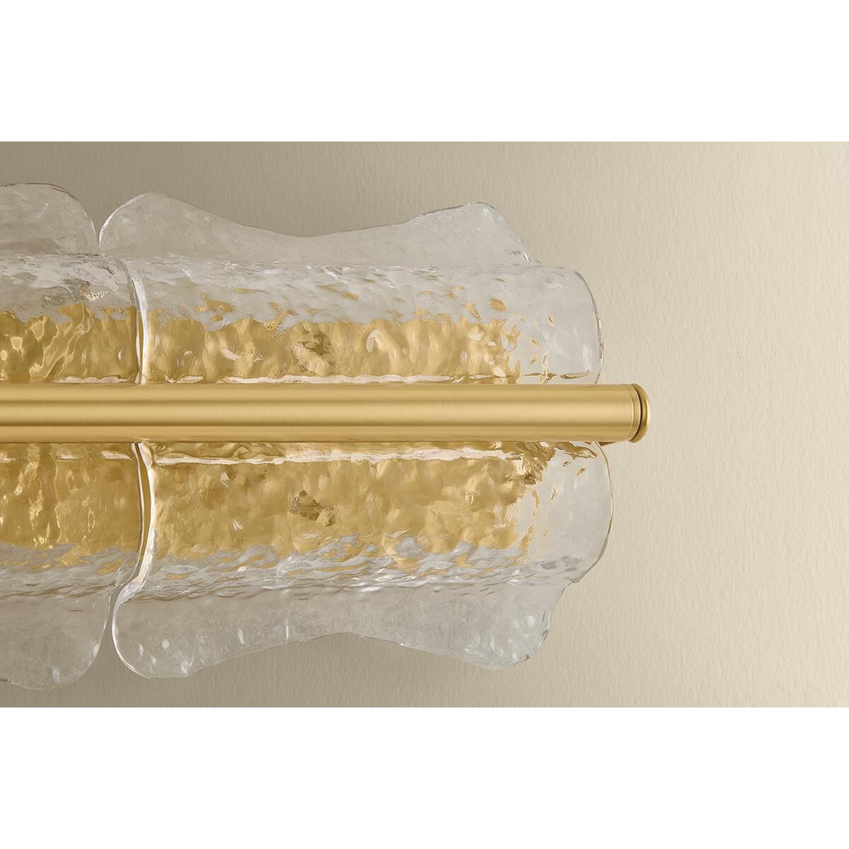 Shown in Aged Brass finish and Clear Optic glass