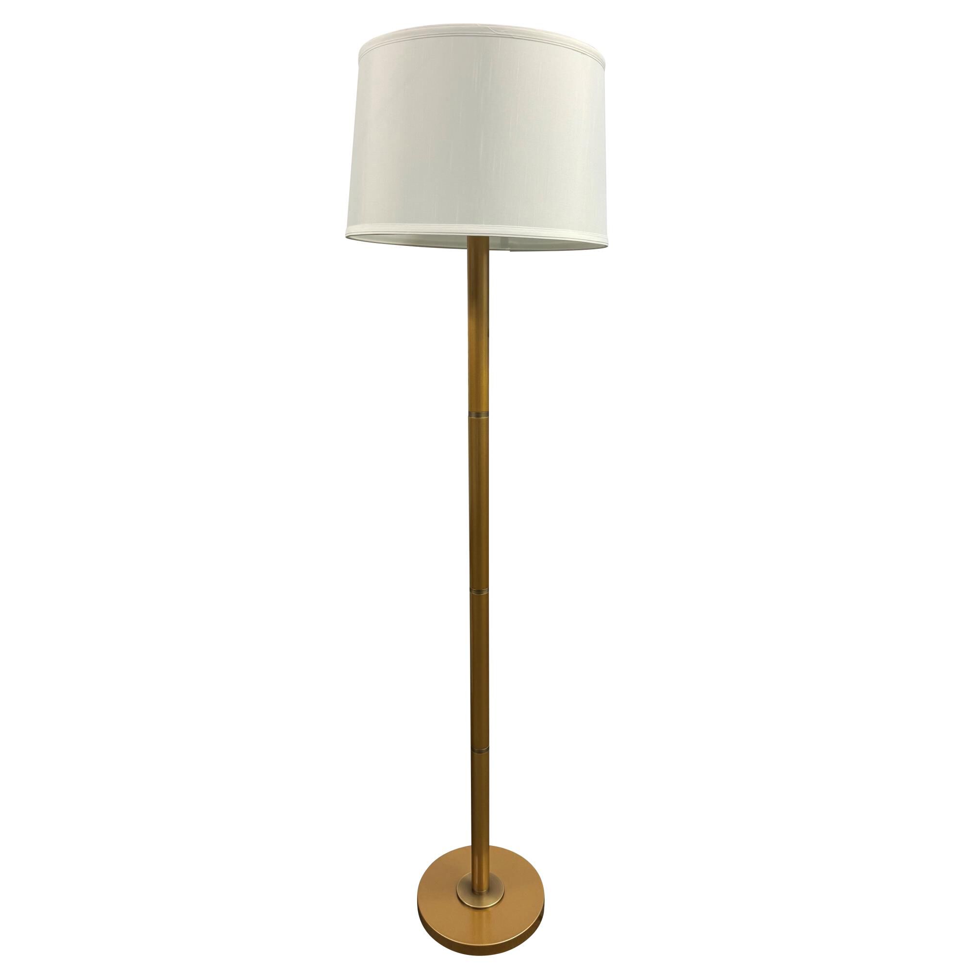 Shown in Heritage Gold and Antique Brass finish and White Linen Hardback shade