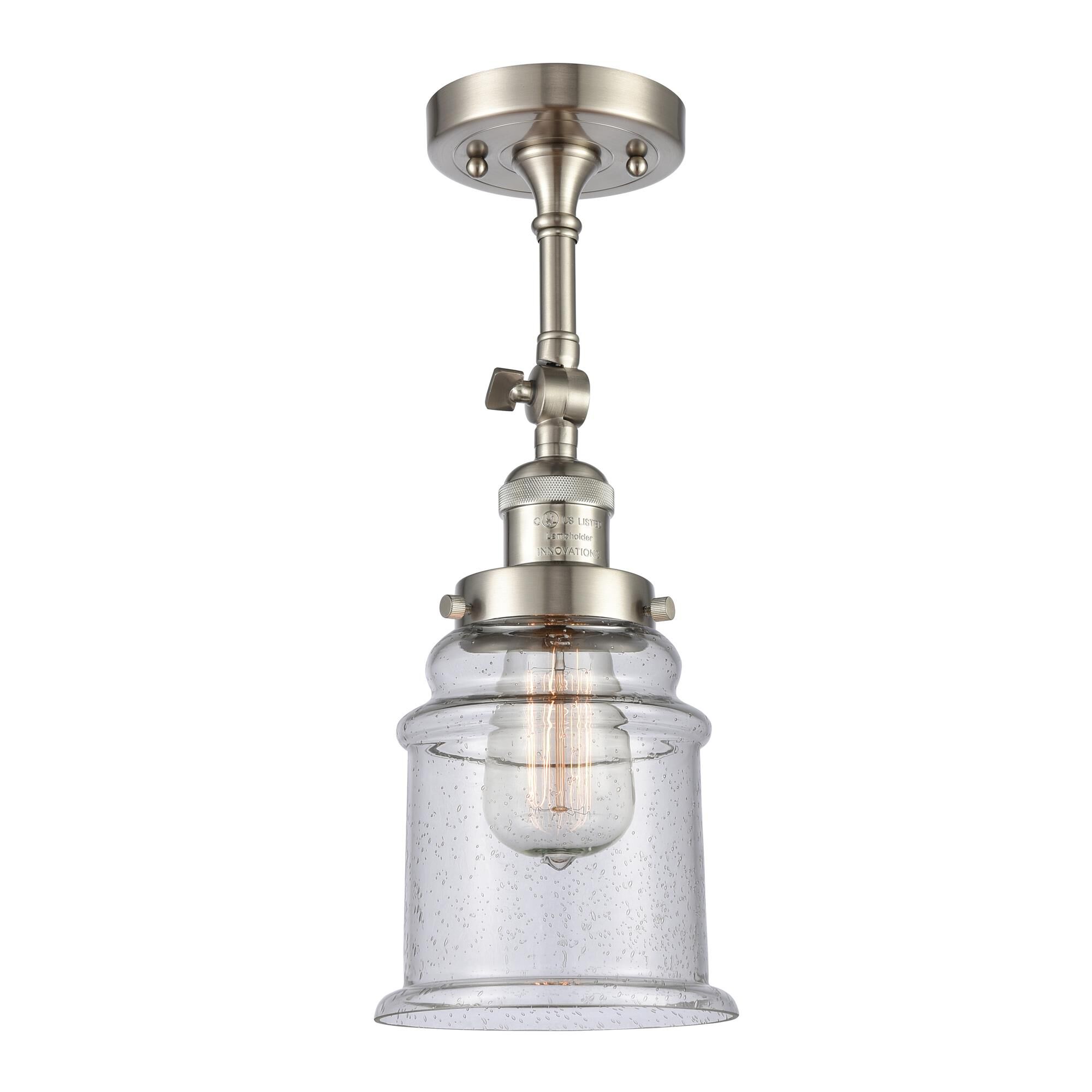 Shown in Brushed Satin Nickel finish and Seedy glass and None accent