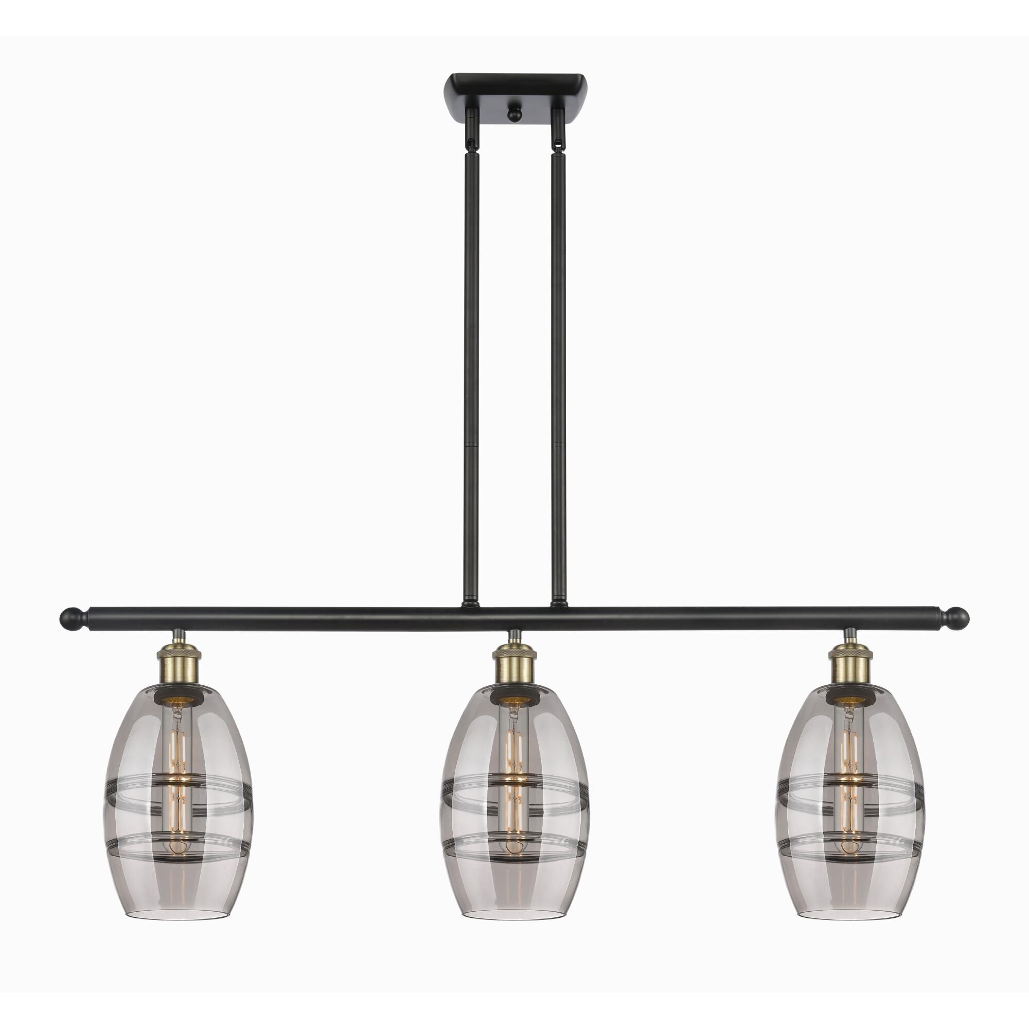 Shown in Black Antique Brass finish and Light Smoke glass