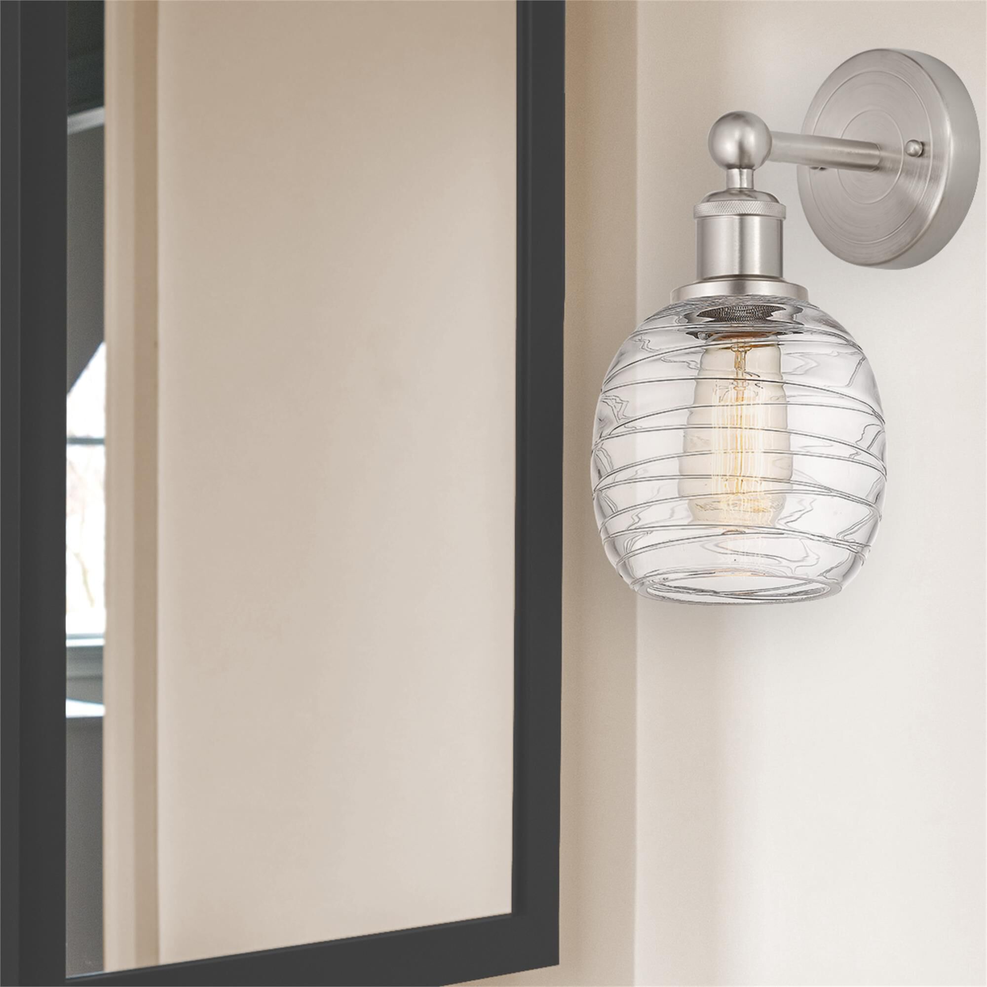Shown in Brushed Satin Nickel  finish and Deco Swirl glass