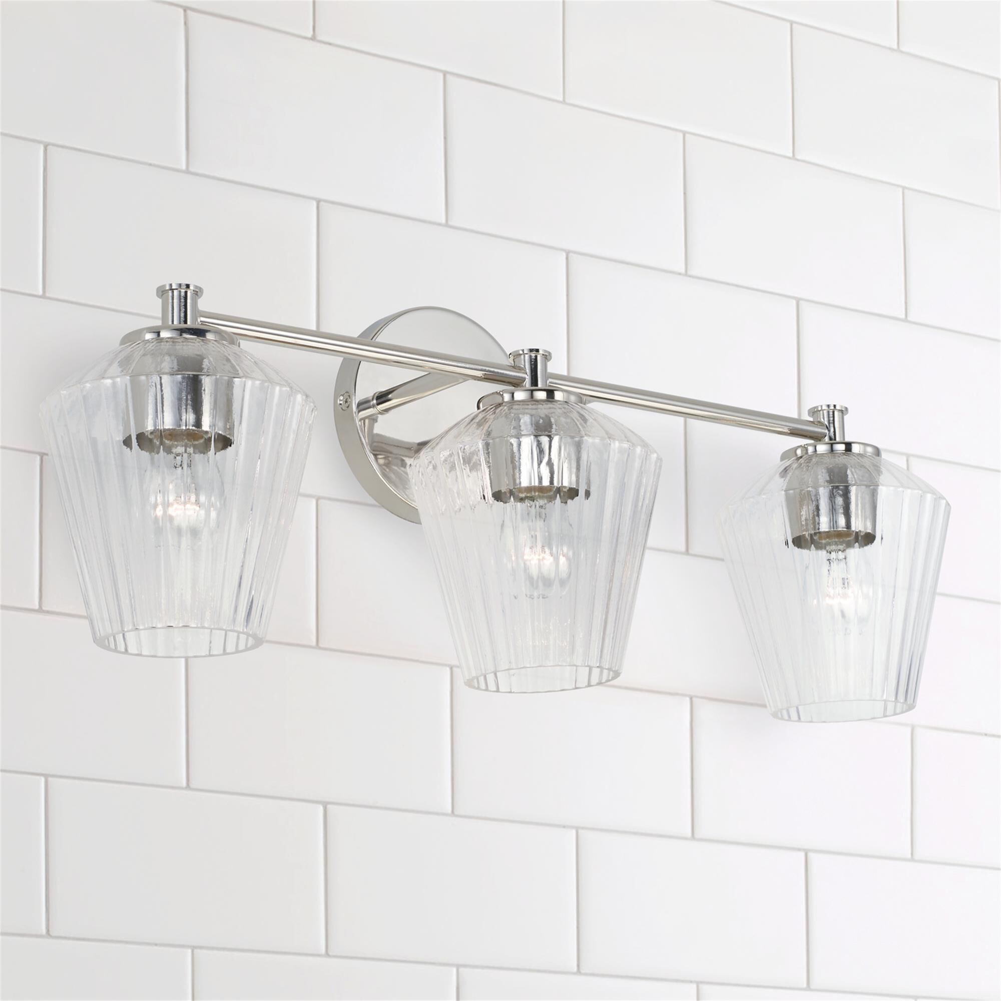 Shown in Polished Nickel finish and Clear Fluted glass