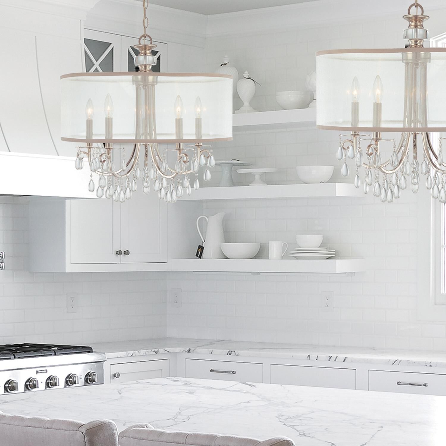 Shown in Polished Chrome finish and Clear Teardrop Almond crystal and Silk glass and Silk shade