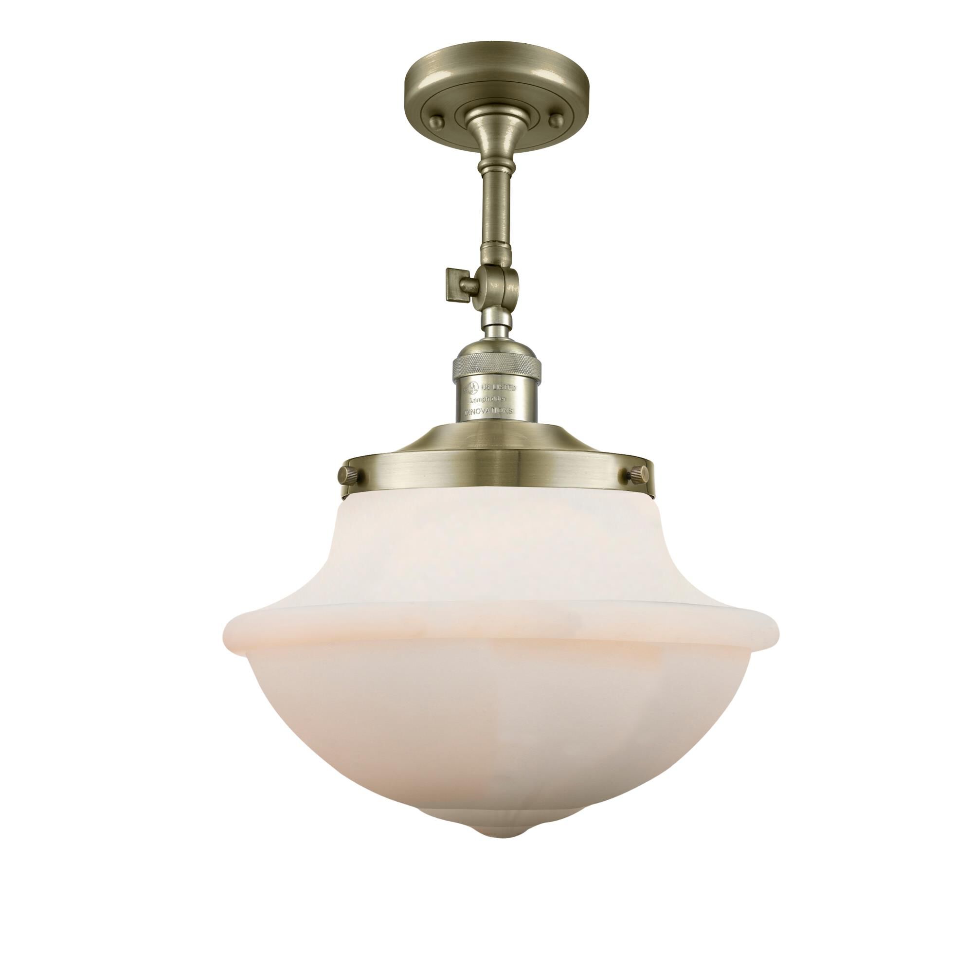 Shown in Antique Brass finish and Schoolhouse glass and Glass shade