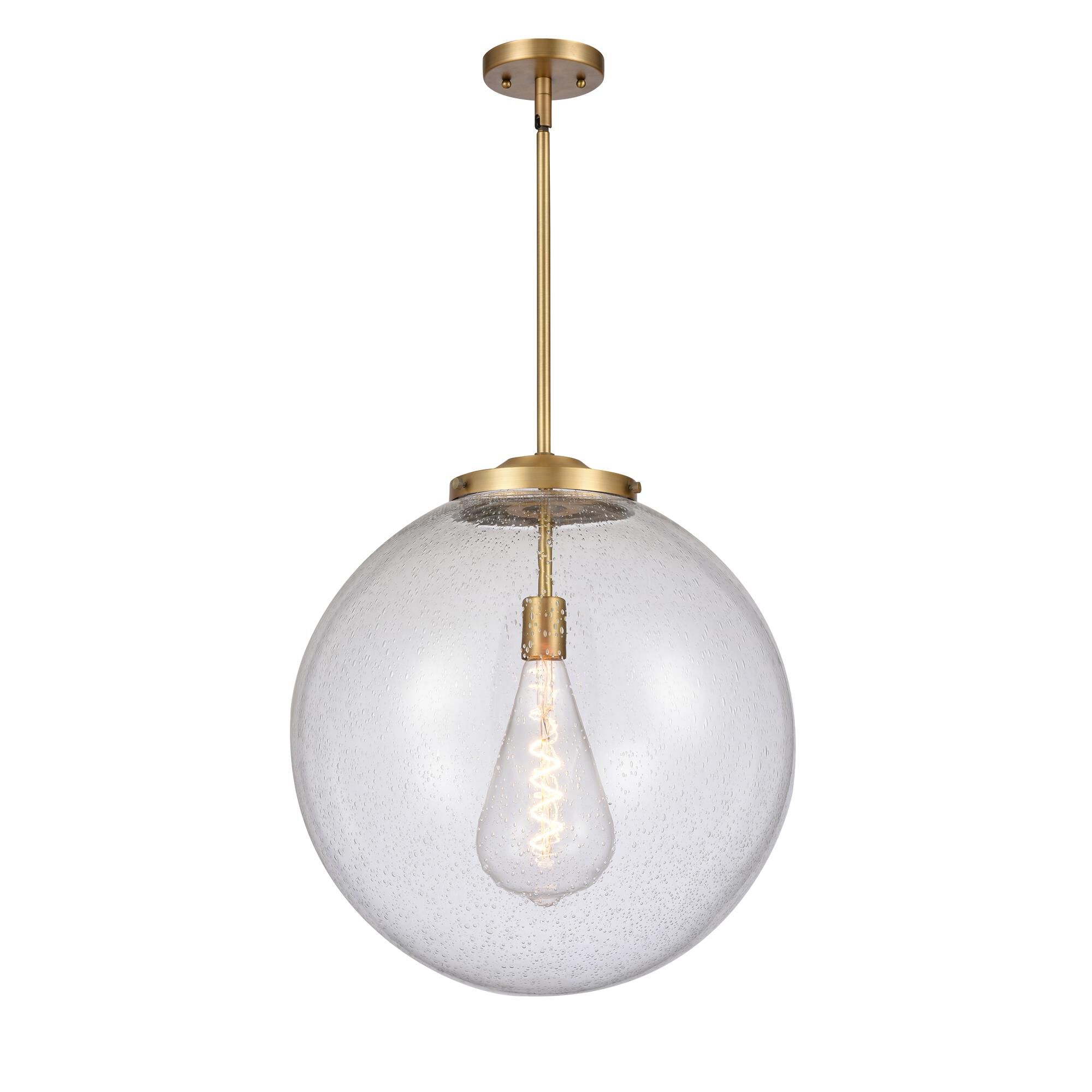 Shown in Brushed Brass finish and Seedy Beacon glass