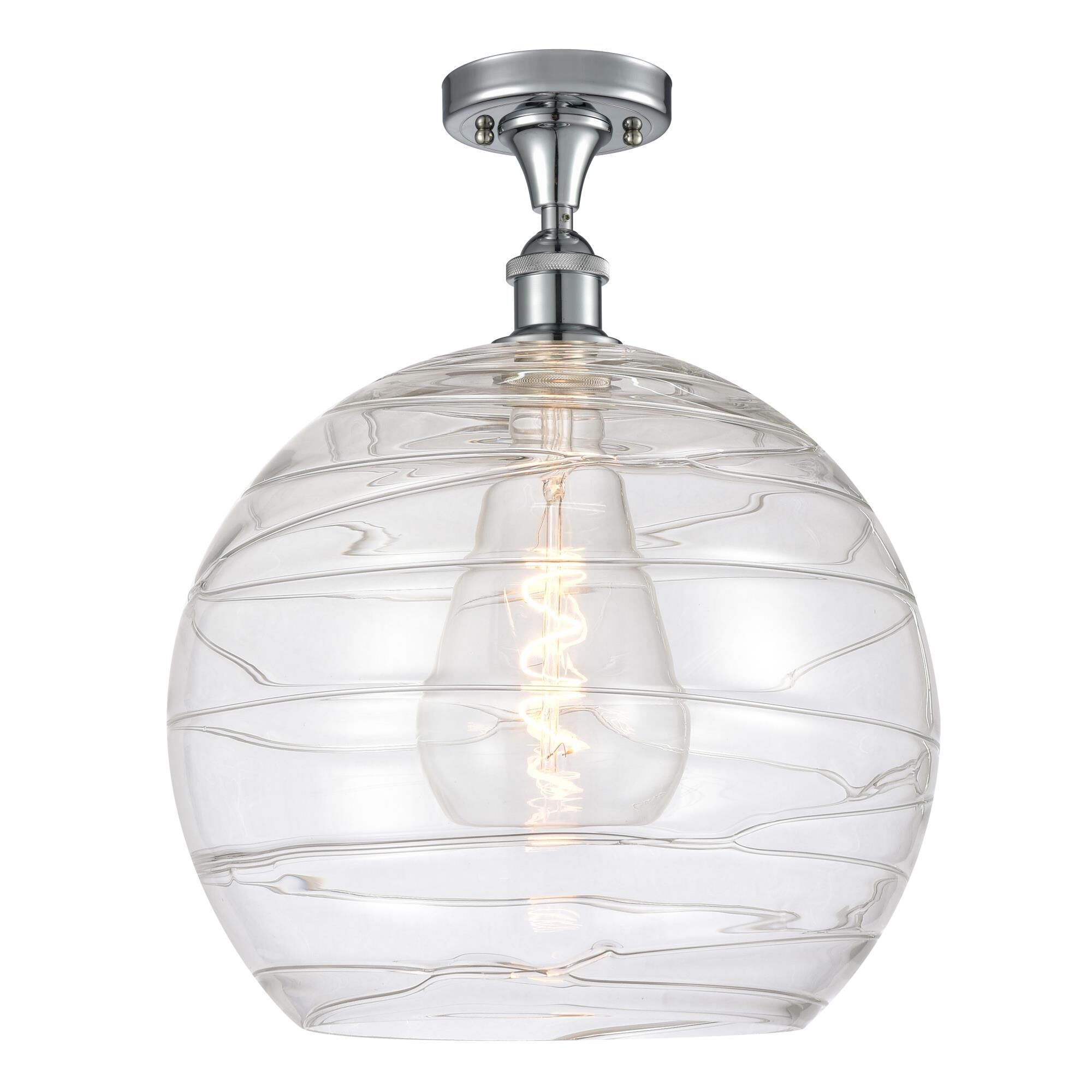 Shown in Polished Chrome finish and Clear Deco Swirl glass