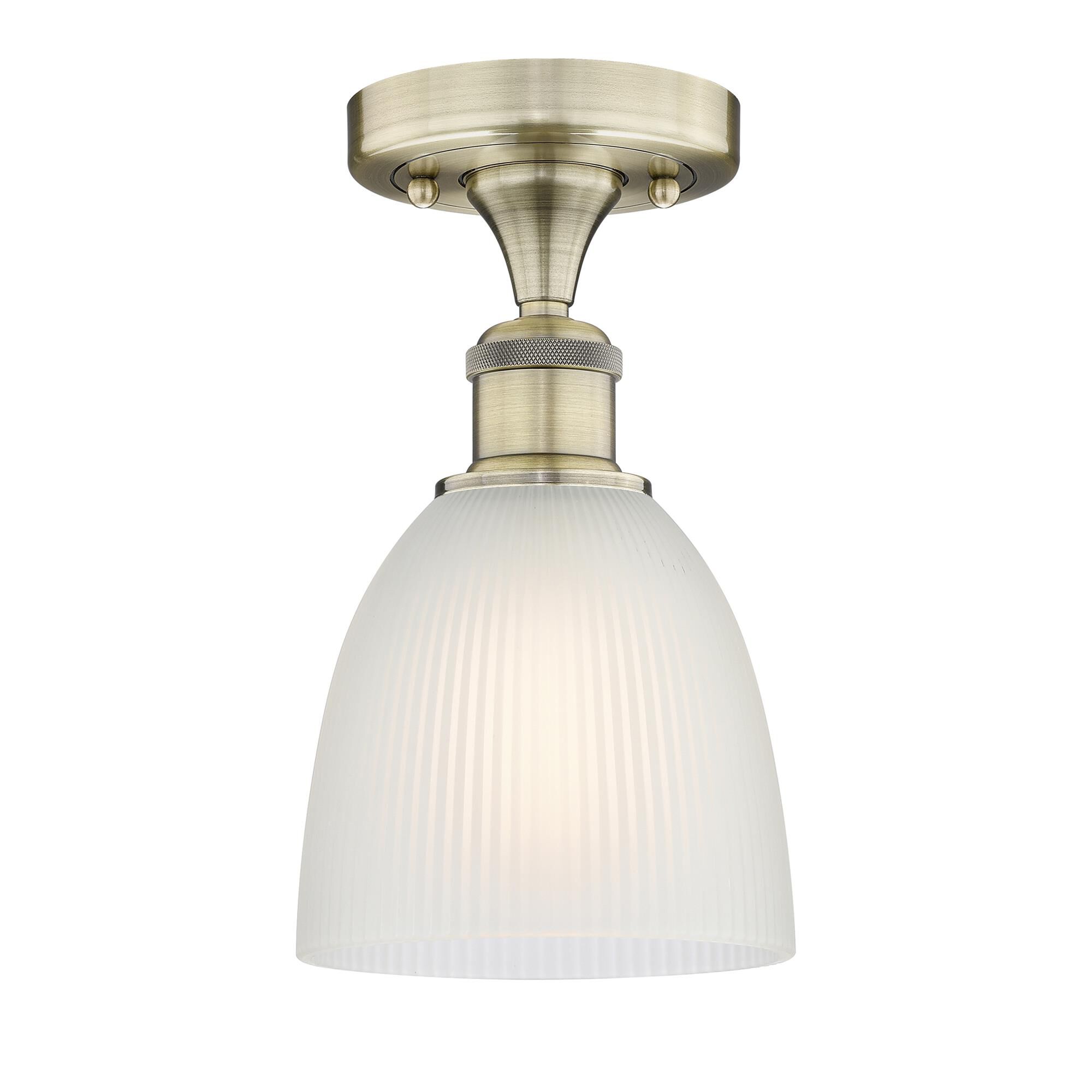 Shown in Antique Brass finish and White glass