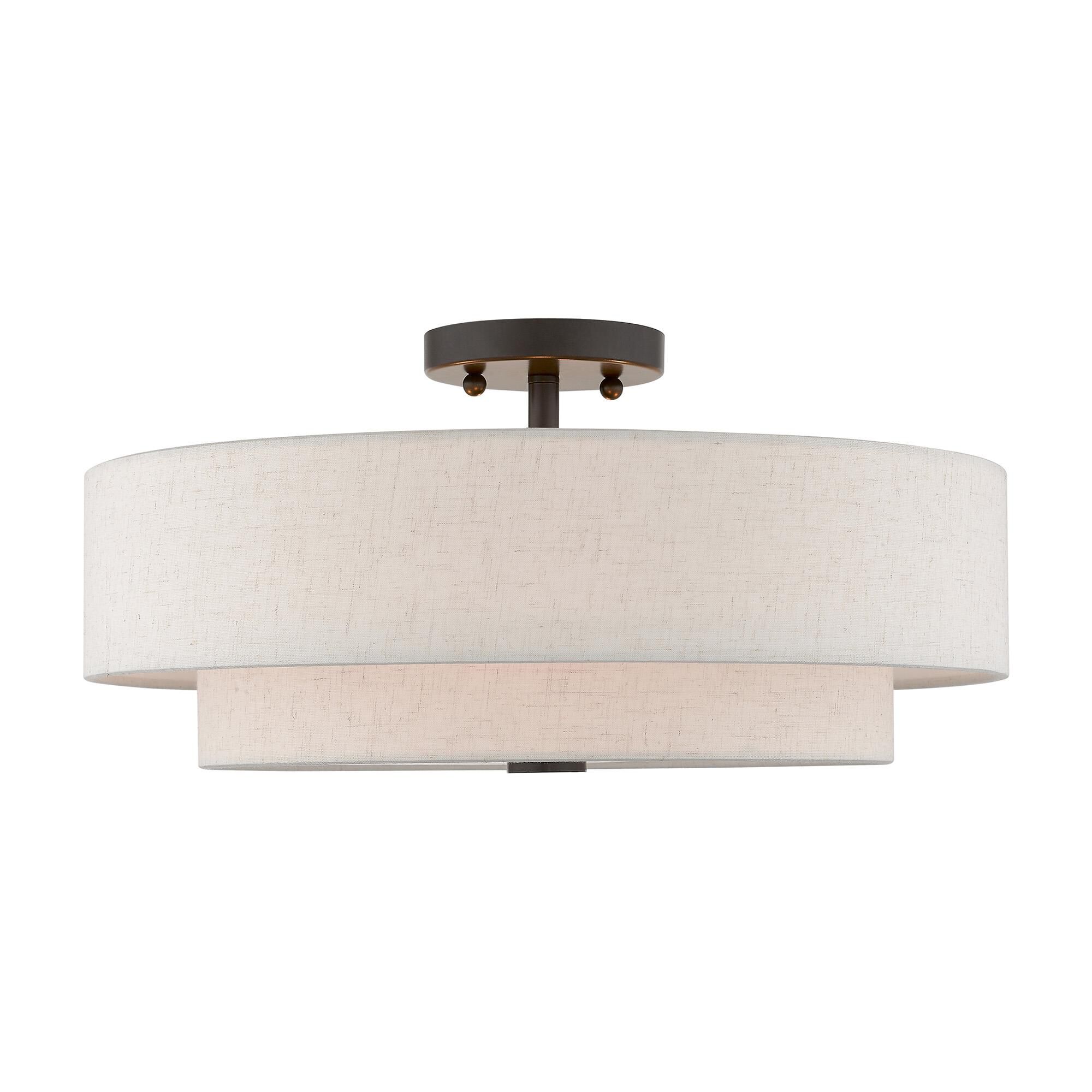 Shown in English Bronze finish and Hand Crafted Oatmeal Color Fabric Outside & White Fabric Inside Hardback shade