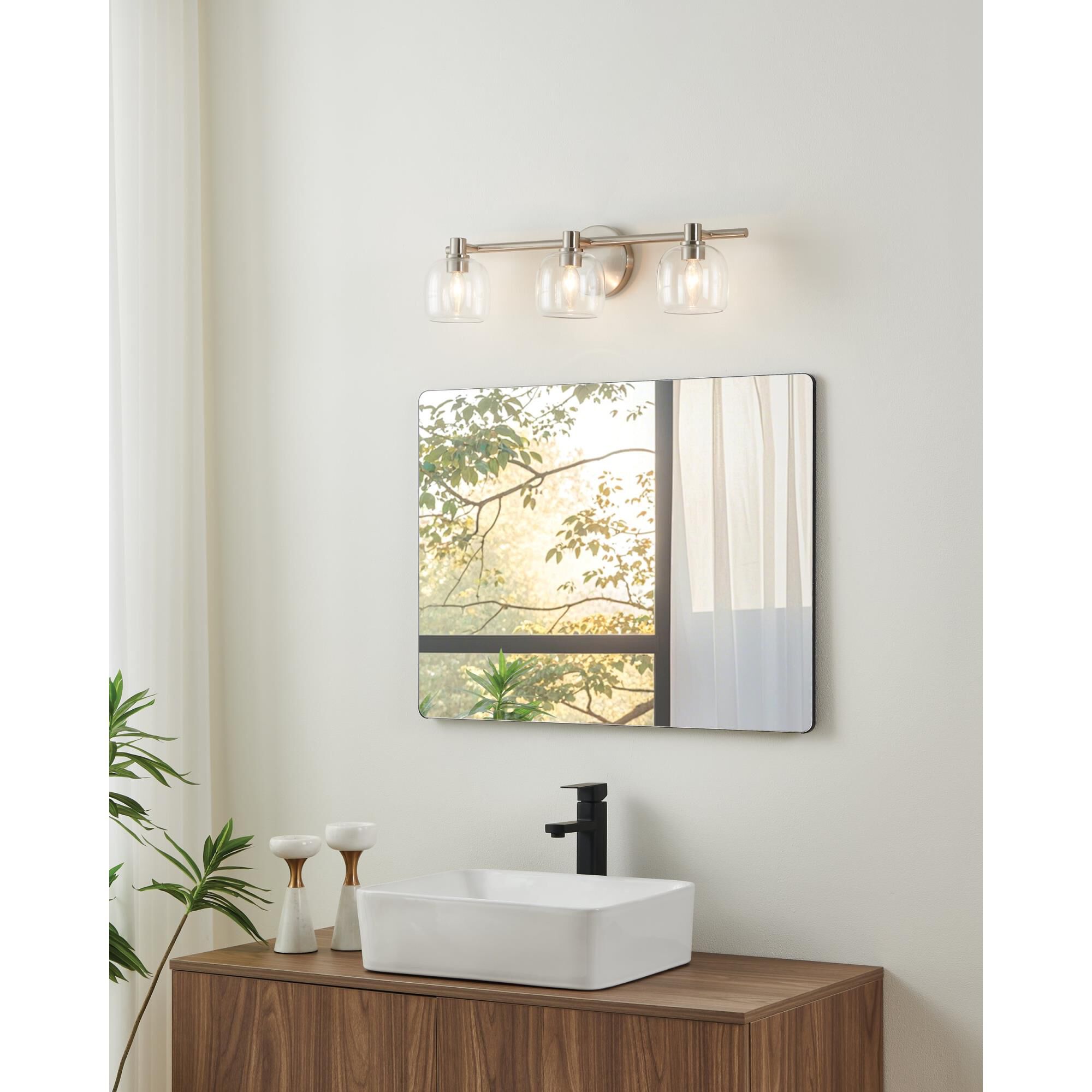 Shown in Brushed Nickel finish and Clear glass