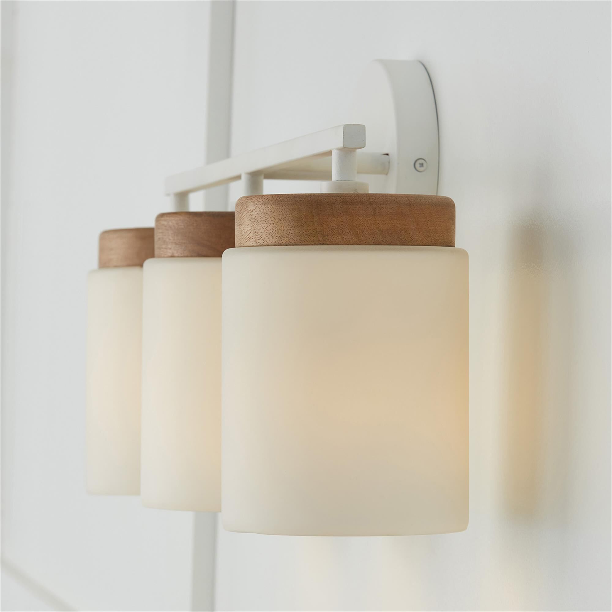 Shown in Light Wood And White finish and Soft White glass