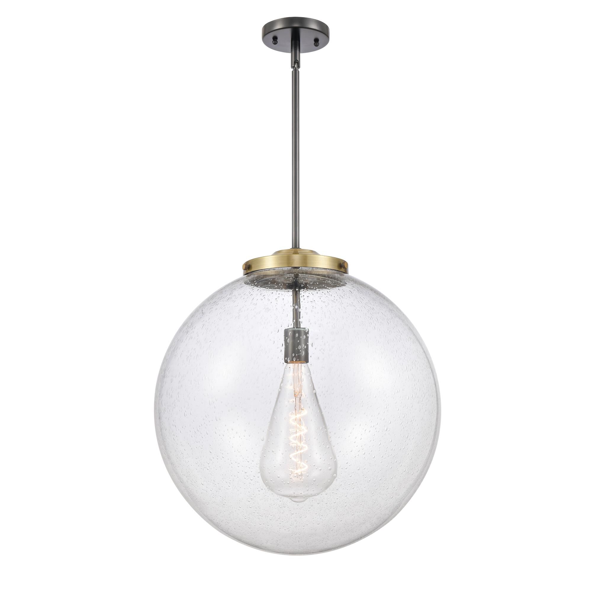 Shown in Black Antique Brass finish and Seedy Beacon glass