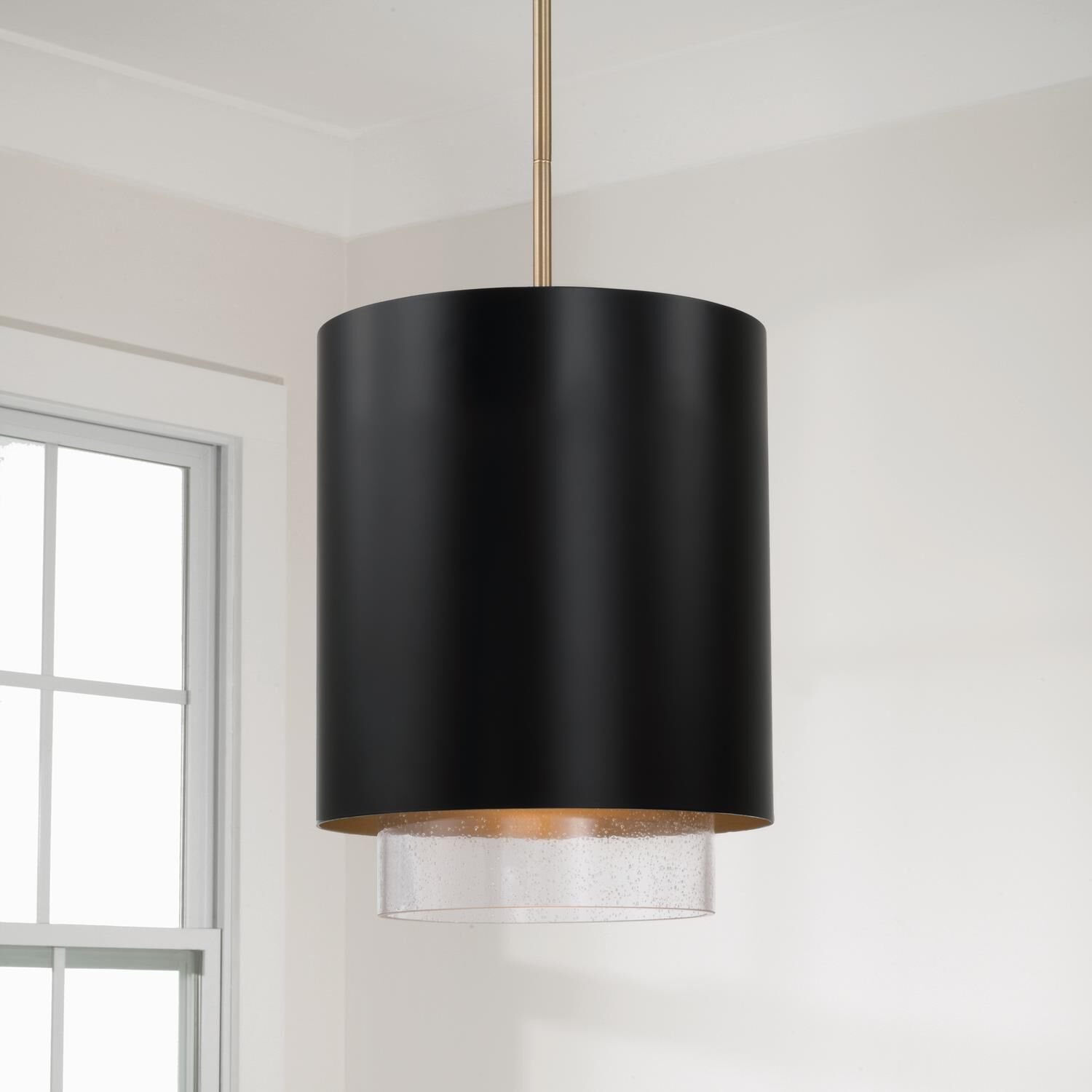 Shown in Matte Brass and Black finish and Clear Seeded glass and Metal with Brass Interior shade