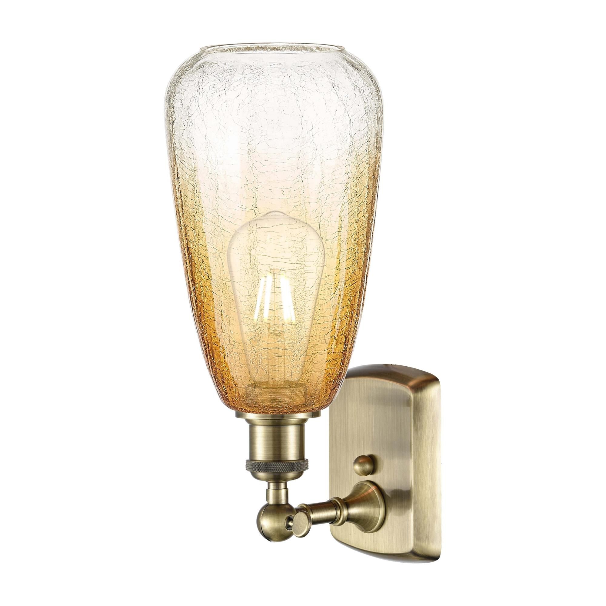 Shown in Antique Brass finish and Amber glass