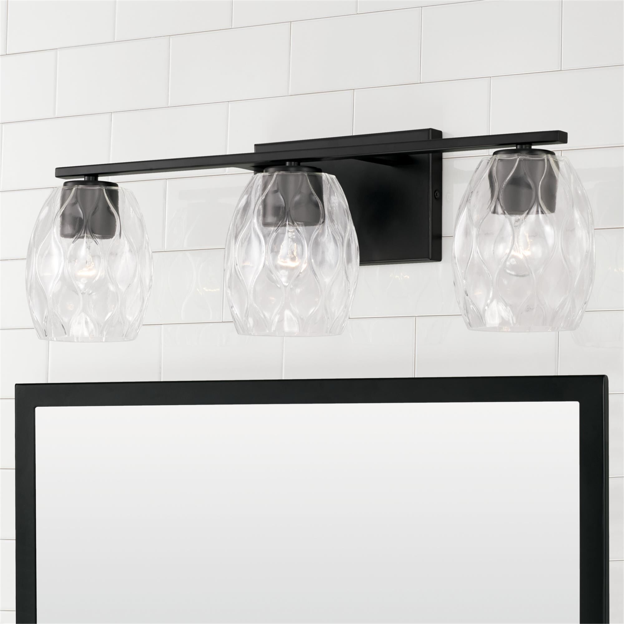 Shown in Matte Black finish and Wavy Embossed glass