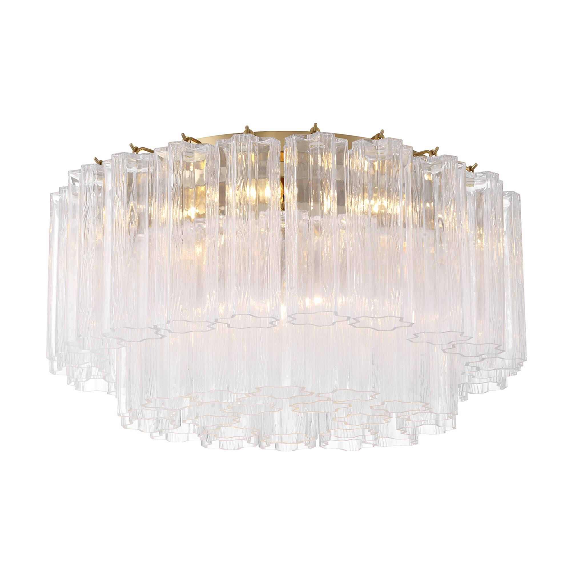 Shown in Aged Brass finish and Tronchi Clear glass
