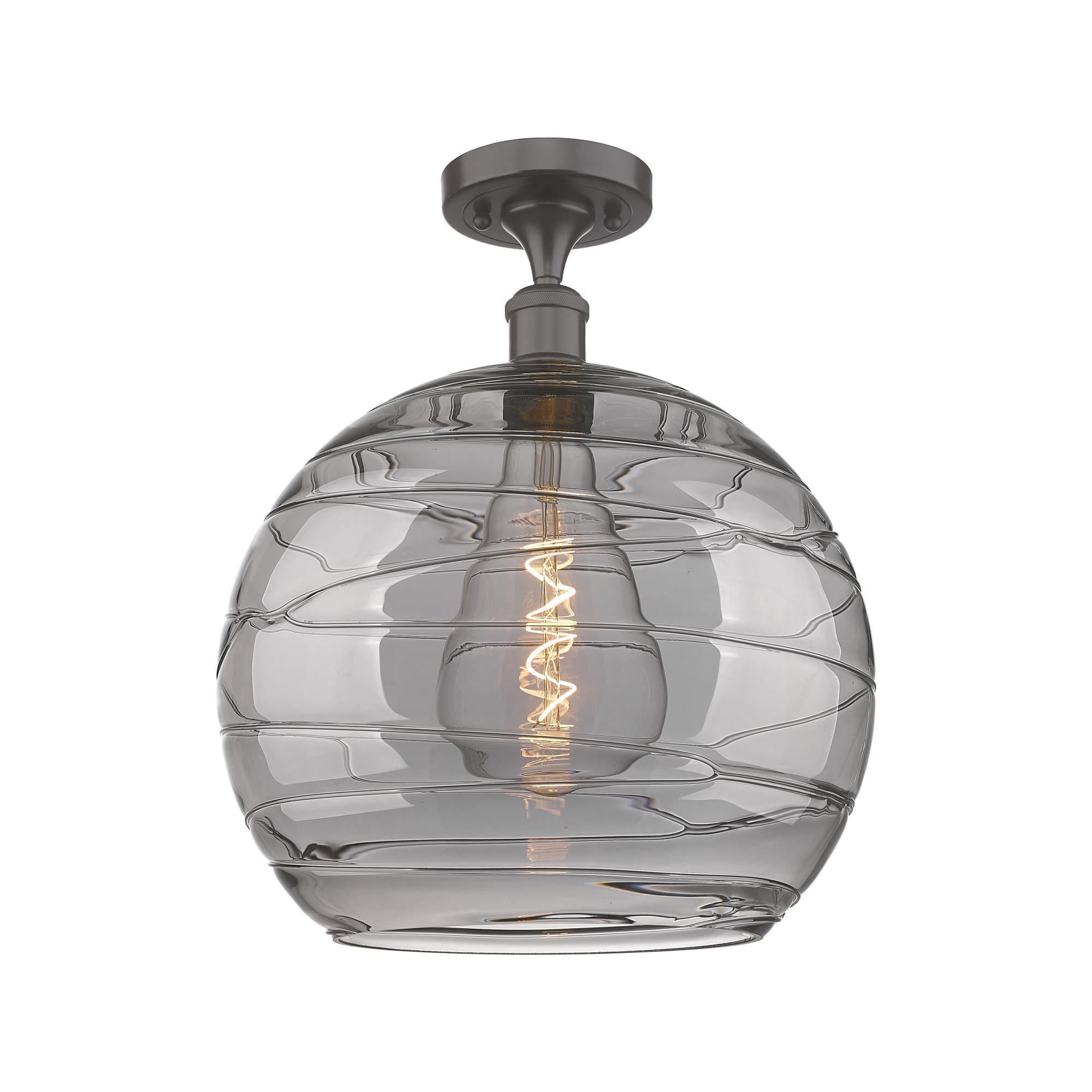 Shown in Oil Rubbed Bronze finish and Light Smoke Deco Swirl glass