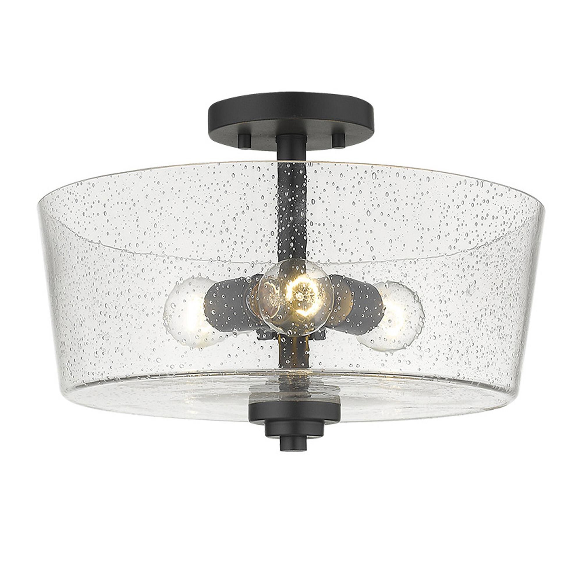 Shown in Matte Black finish and Clear glass and Clear, Seeded Drum Shaped Glass shade