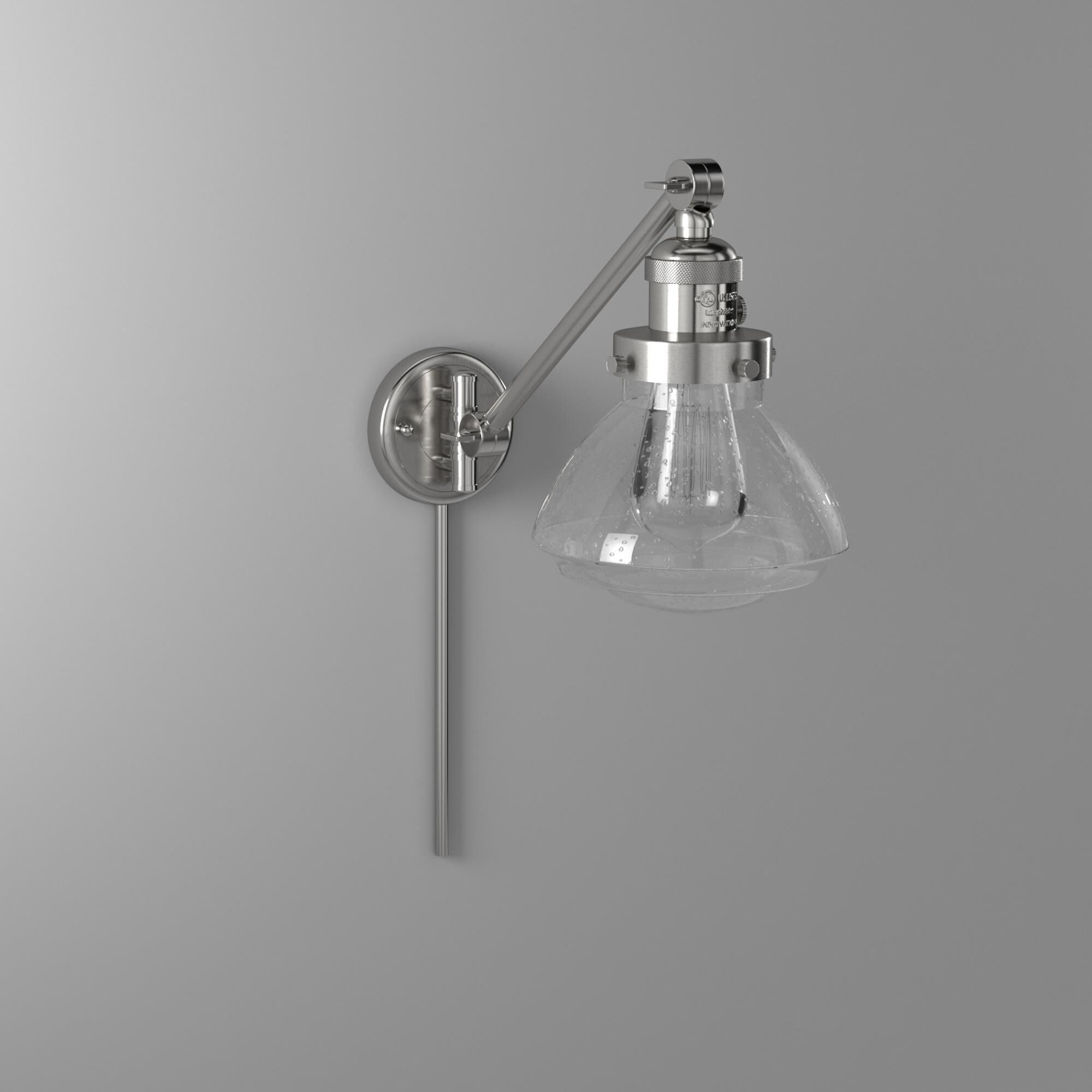 Shown in Brushed Satin Nickel finish and Seeded Seedy Olean glass and Glass shade and Bulb Tint - Amber accent
