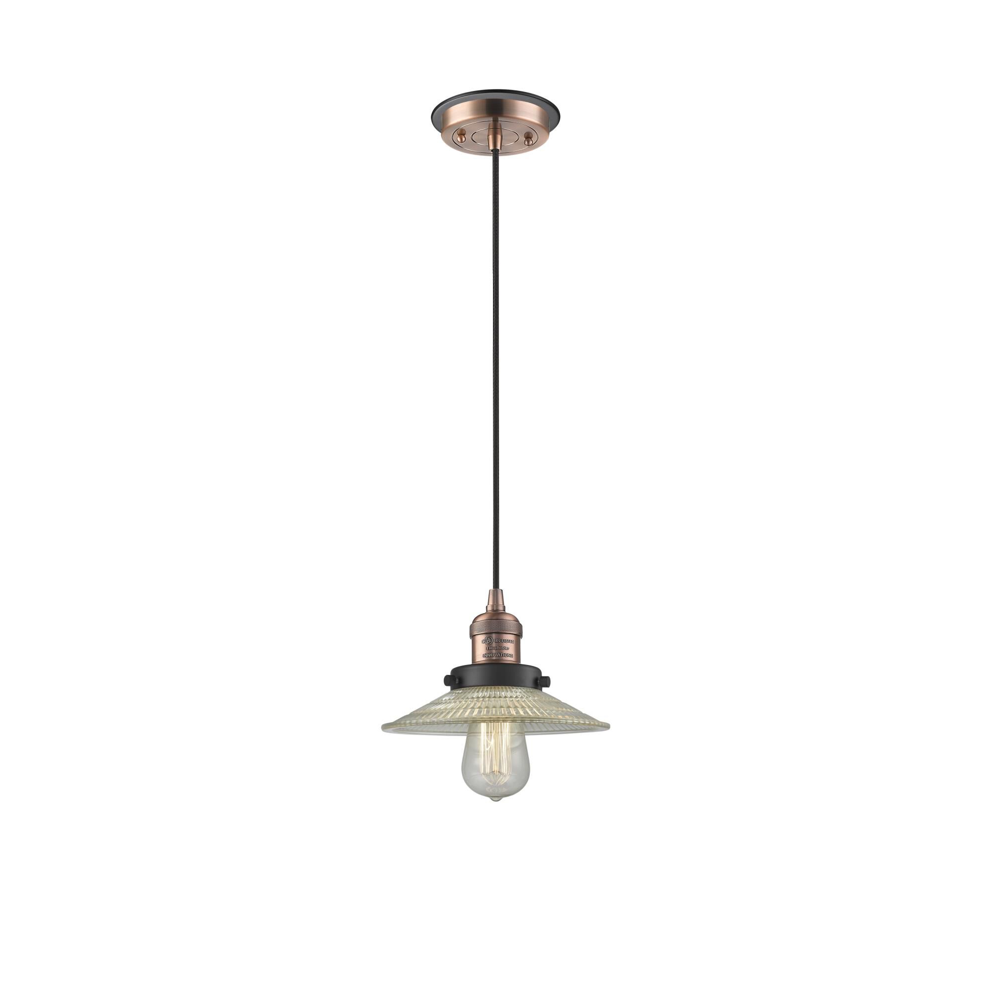 Shown in Antique Copper finish and Clear Halophane glass and Matte Black accent