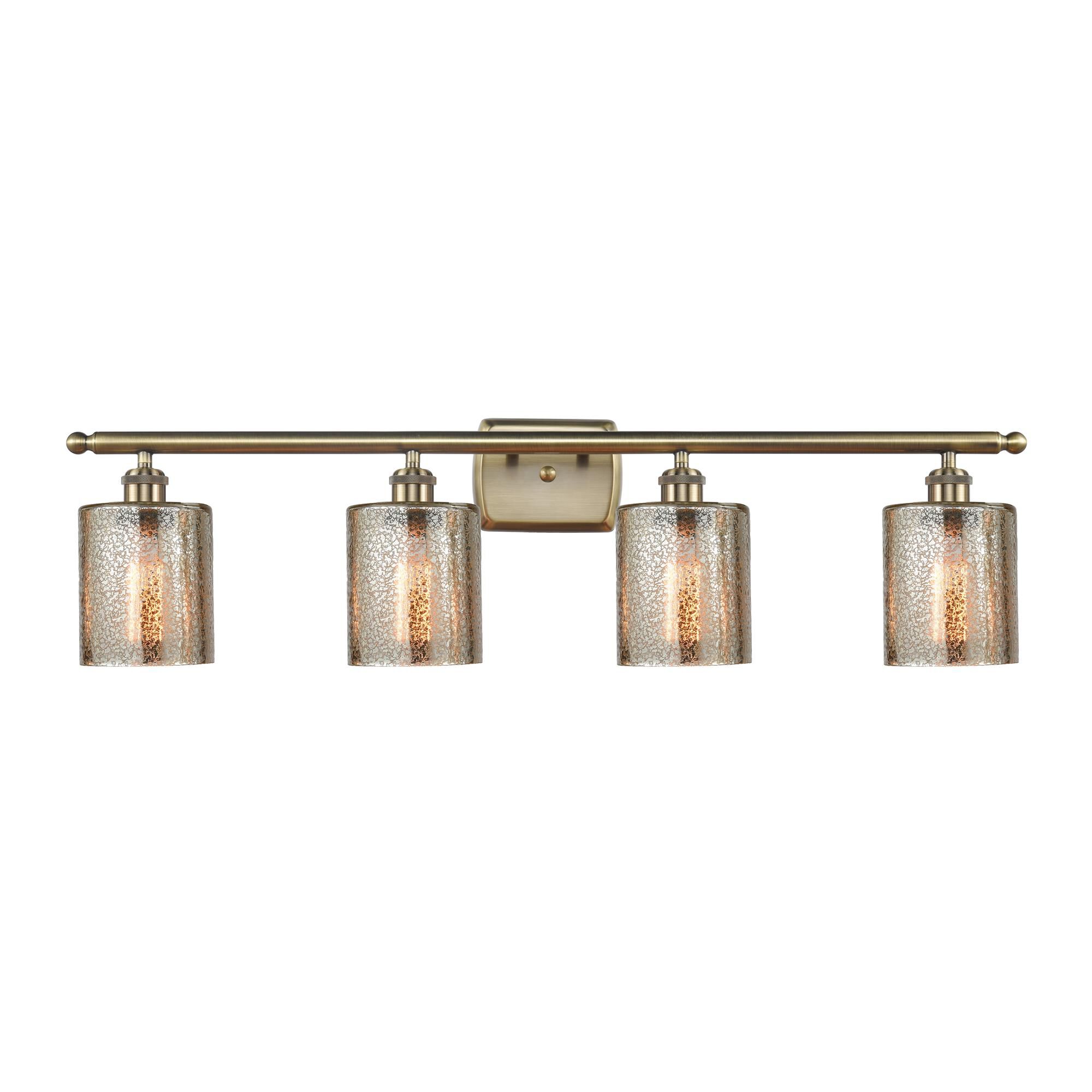 Shown in Antique Brass finish and Mercury Cobbleskill glass and None shade