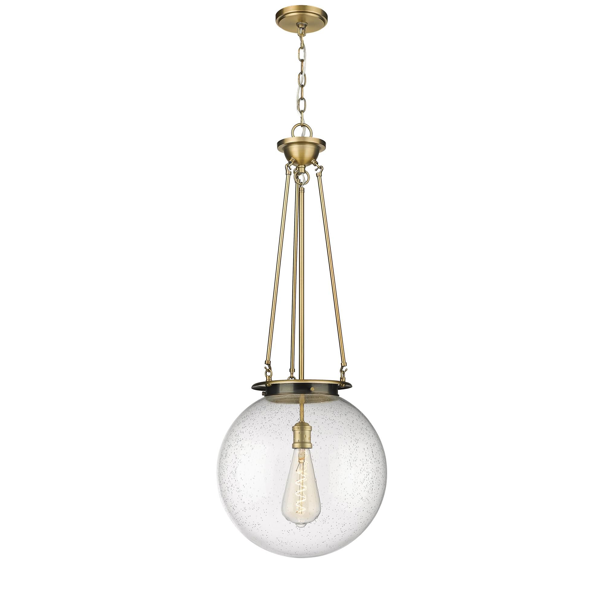 Shown in Brushed Brass finish and Seedy glass