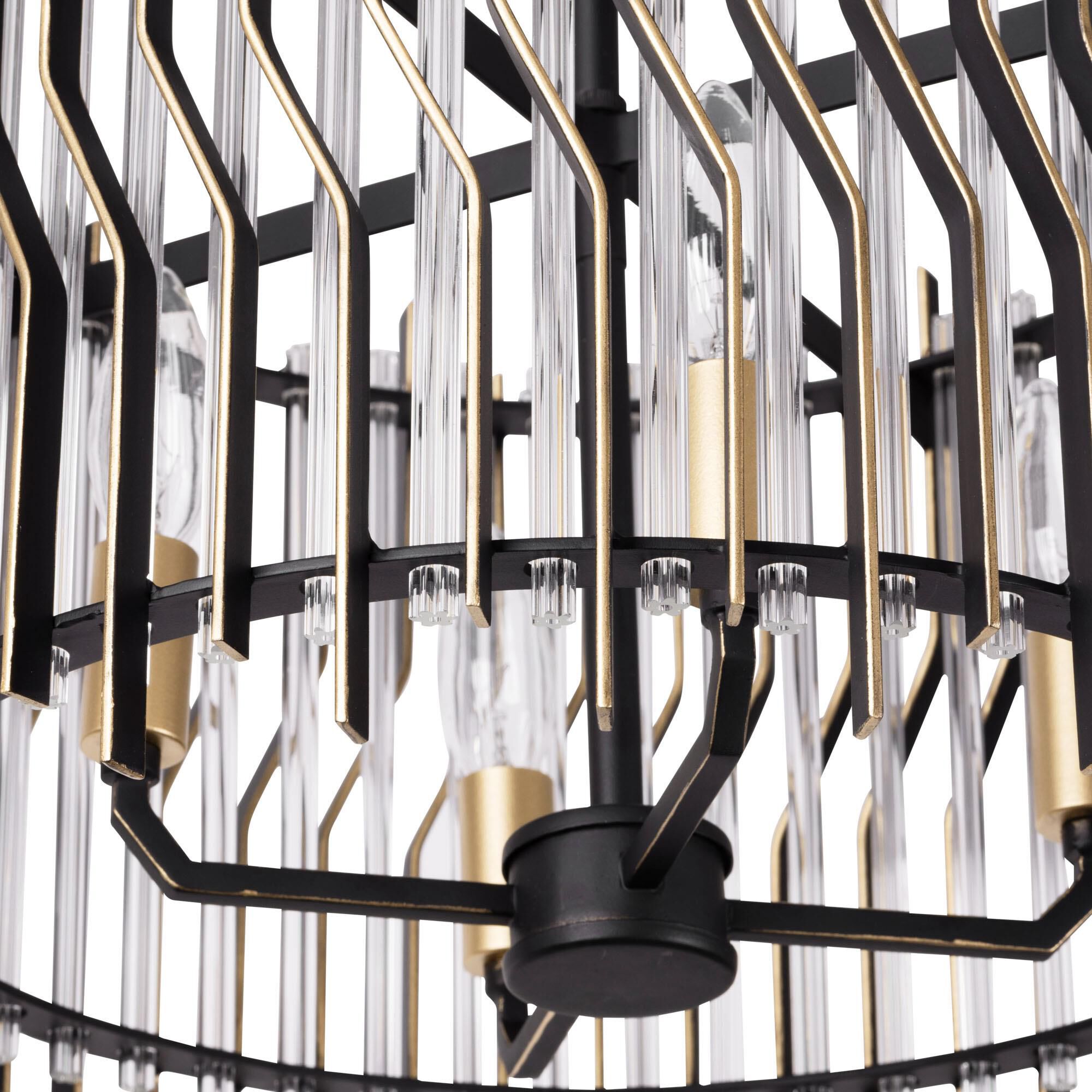 Shown in Matte Black/French Gold finish and Modern Clear Fluted shade