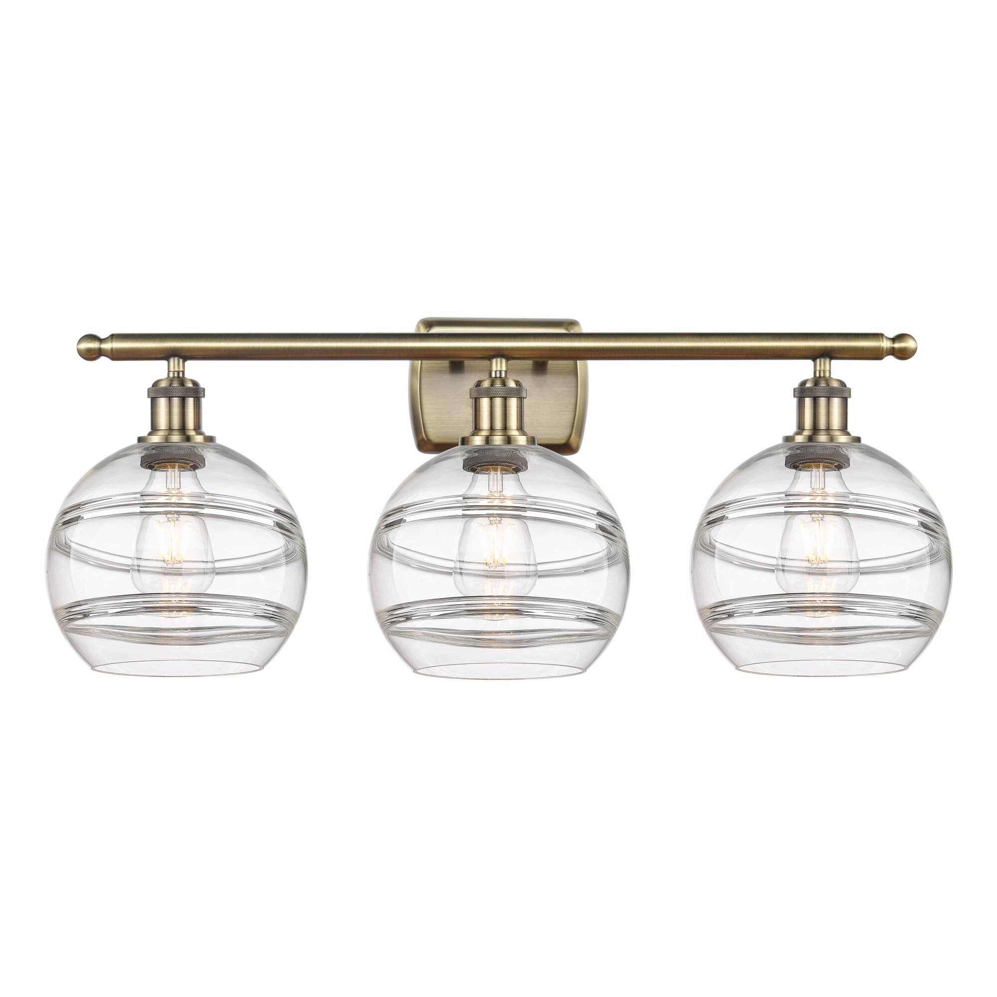 Shown in Antique Brass finish and Clear glass