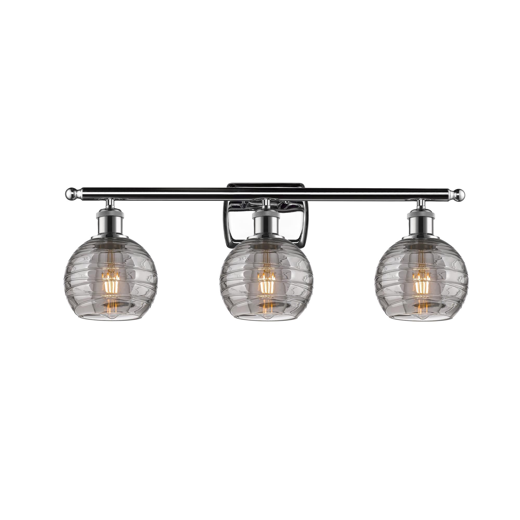 Shown in Polished Chrome finish and Light Smoke Deco Swirl glass