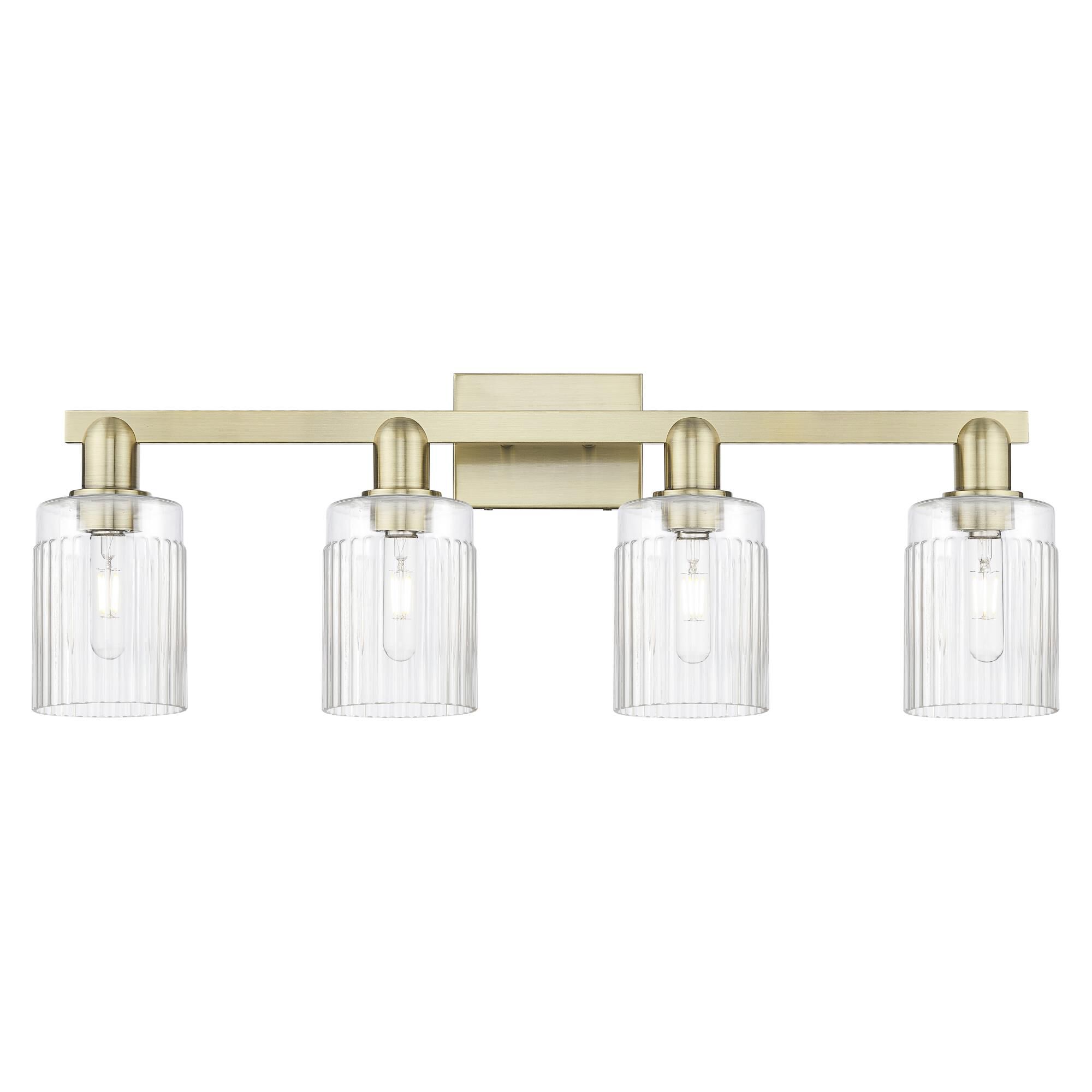 Shown in Antique Brass finish and Clear glass