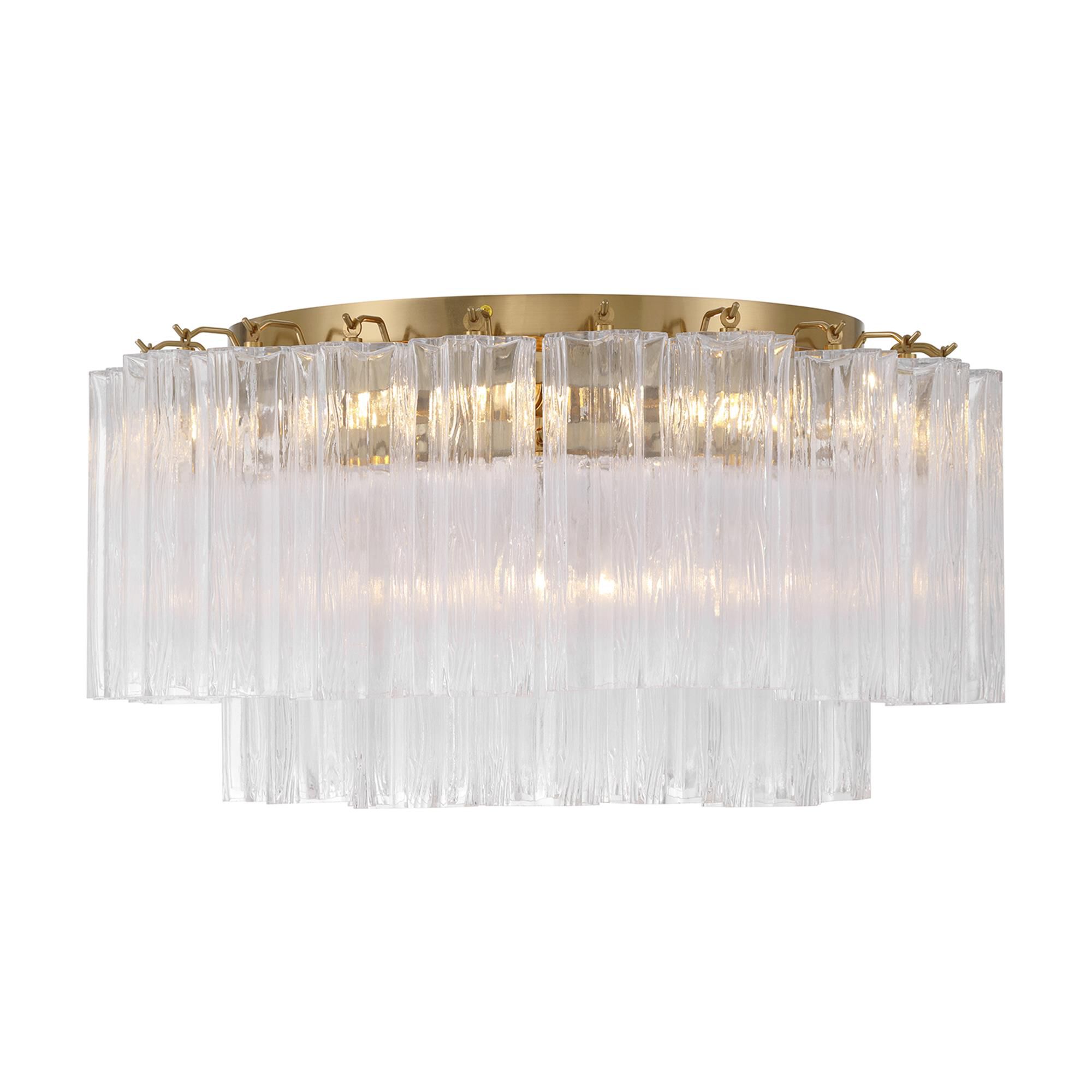 Shown in Aged Brass finish and Tronchi Clear glass