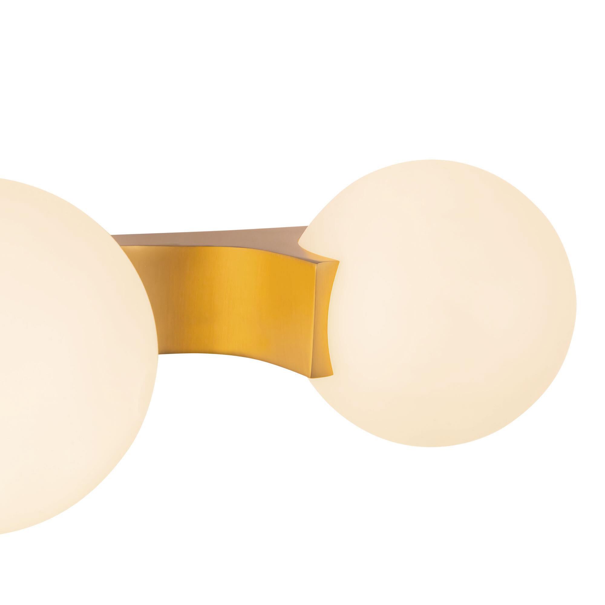 Shown in Brushed Gold finish and Matte Opal glass