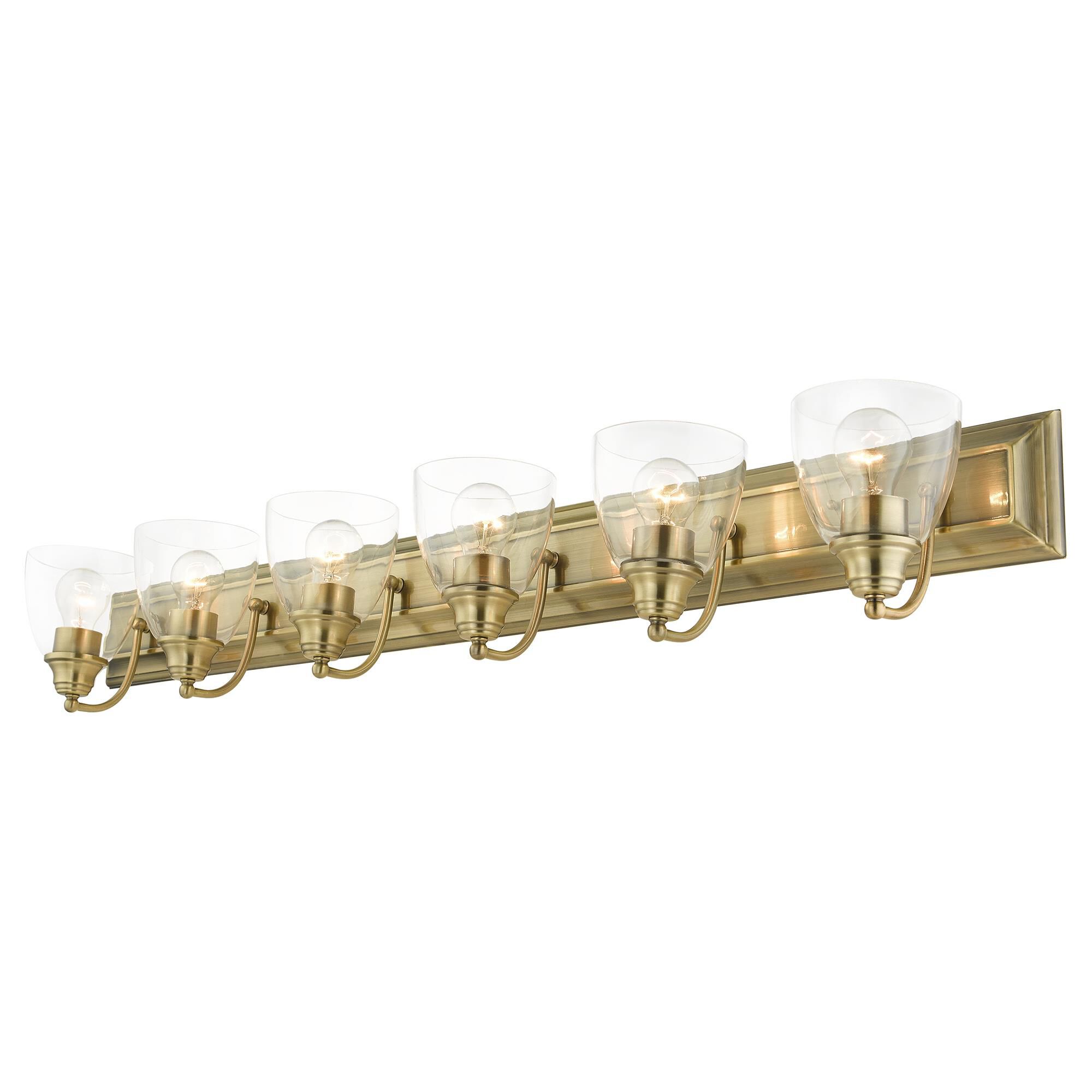 Shown in Antique Brass finish and Hand Blown Clear glass