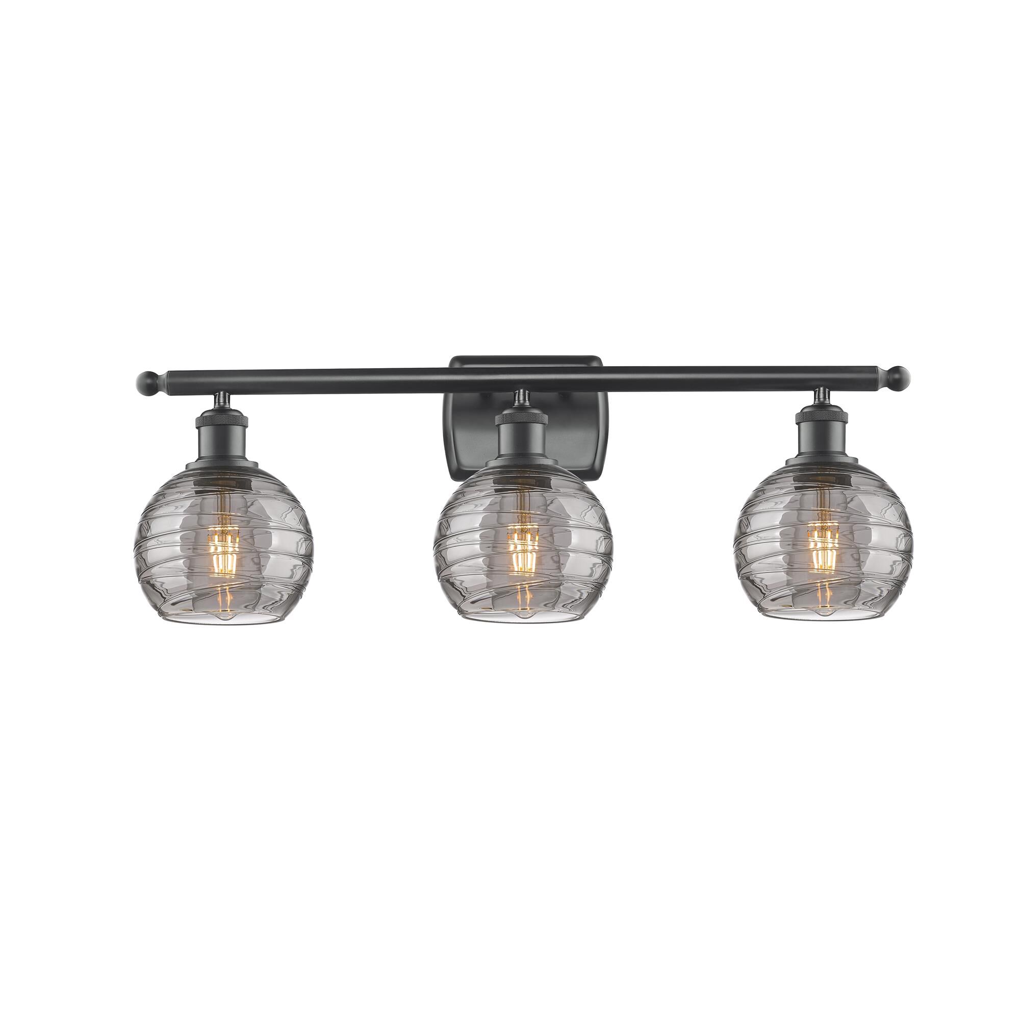 Shown in Matte Black finish and Light Smoke Deco Swirl glass