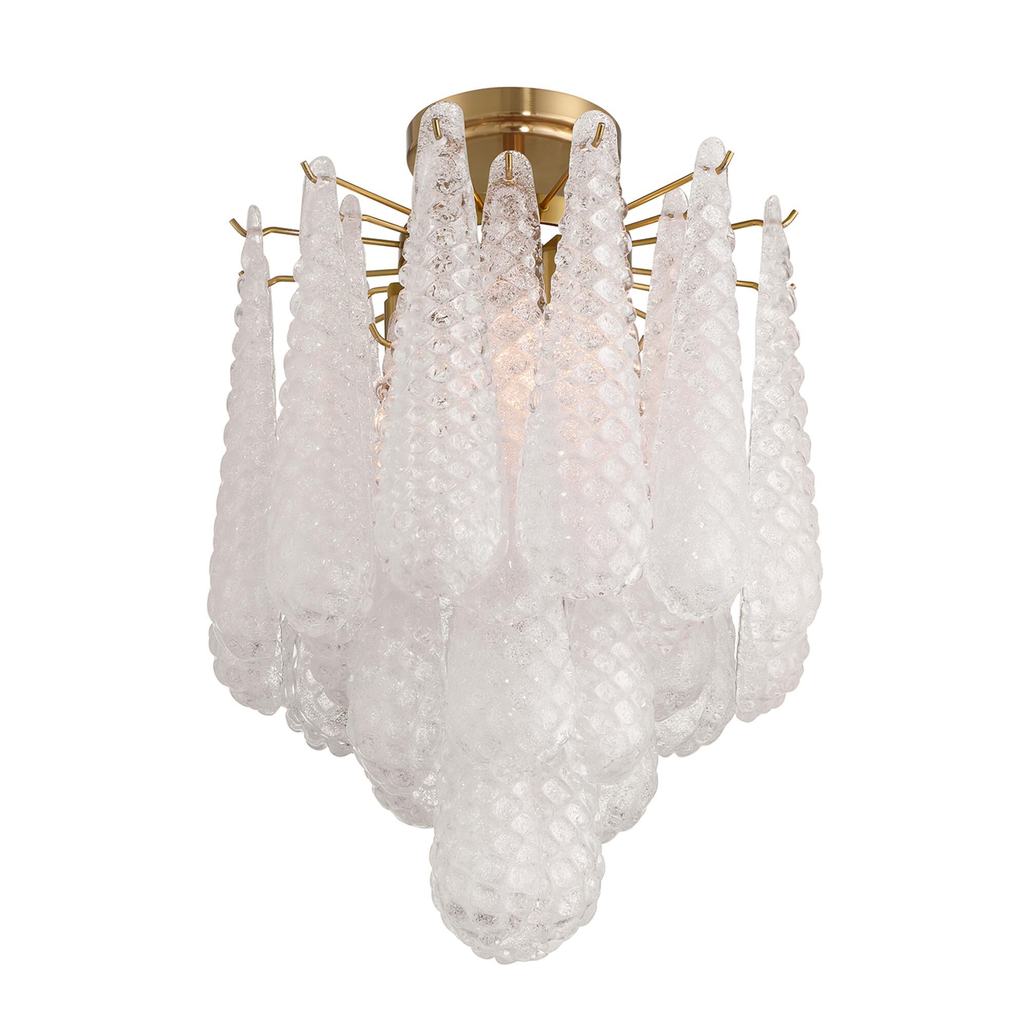 Shown in Aged Brass finish and Sand Clear glass